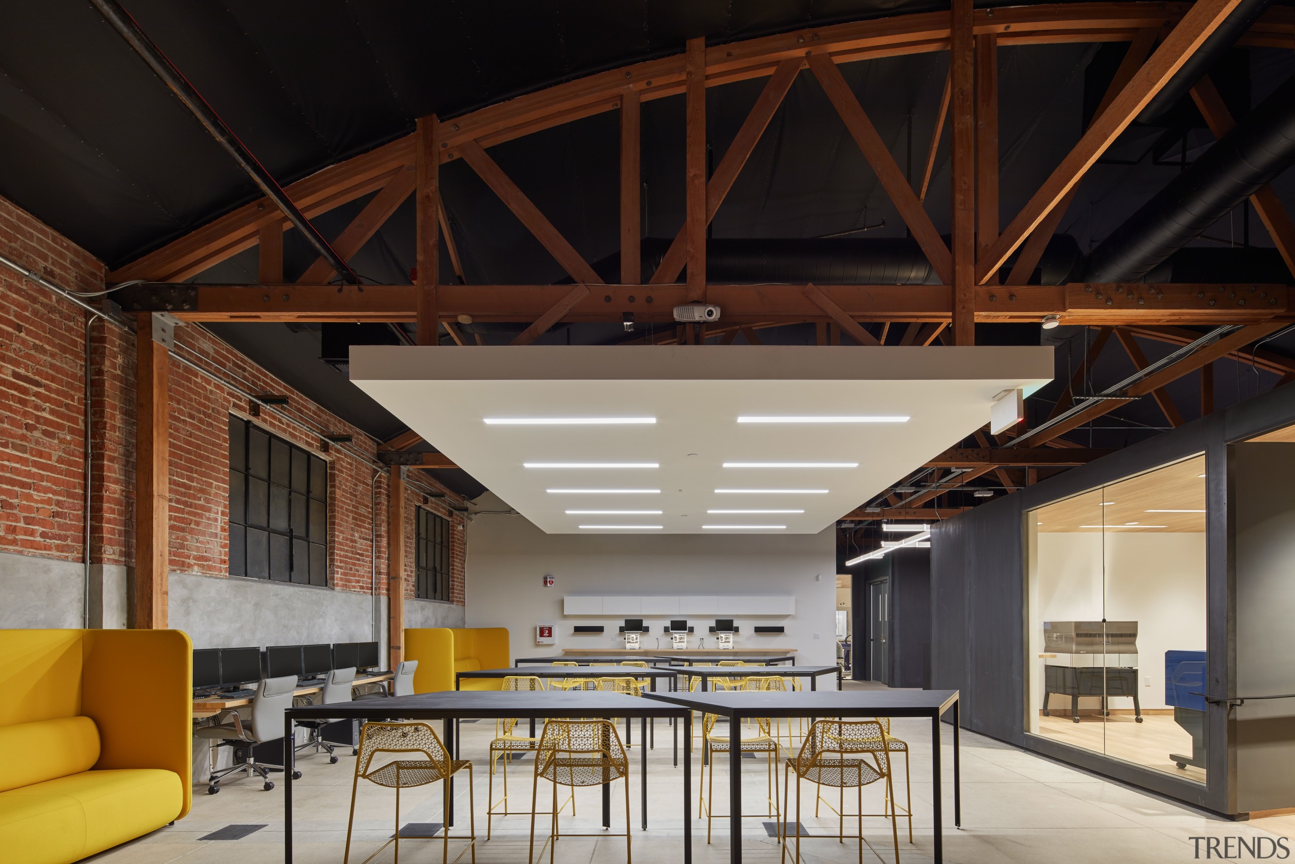 Supplyframe DesignLabs building envelope retains the original brickwork architecture, ceiling, daylighting, interior design, lobby, roof, black, gray