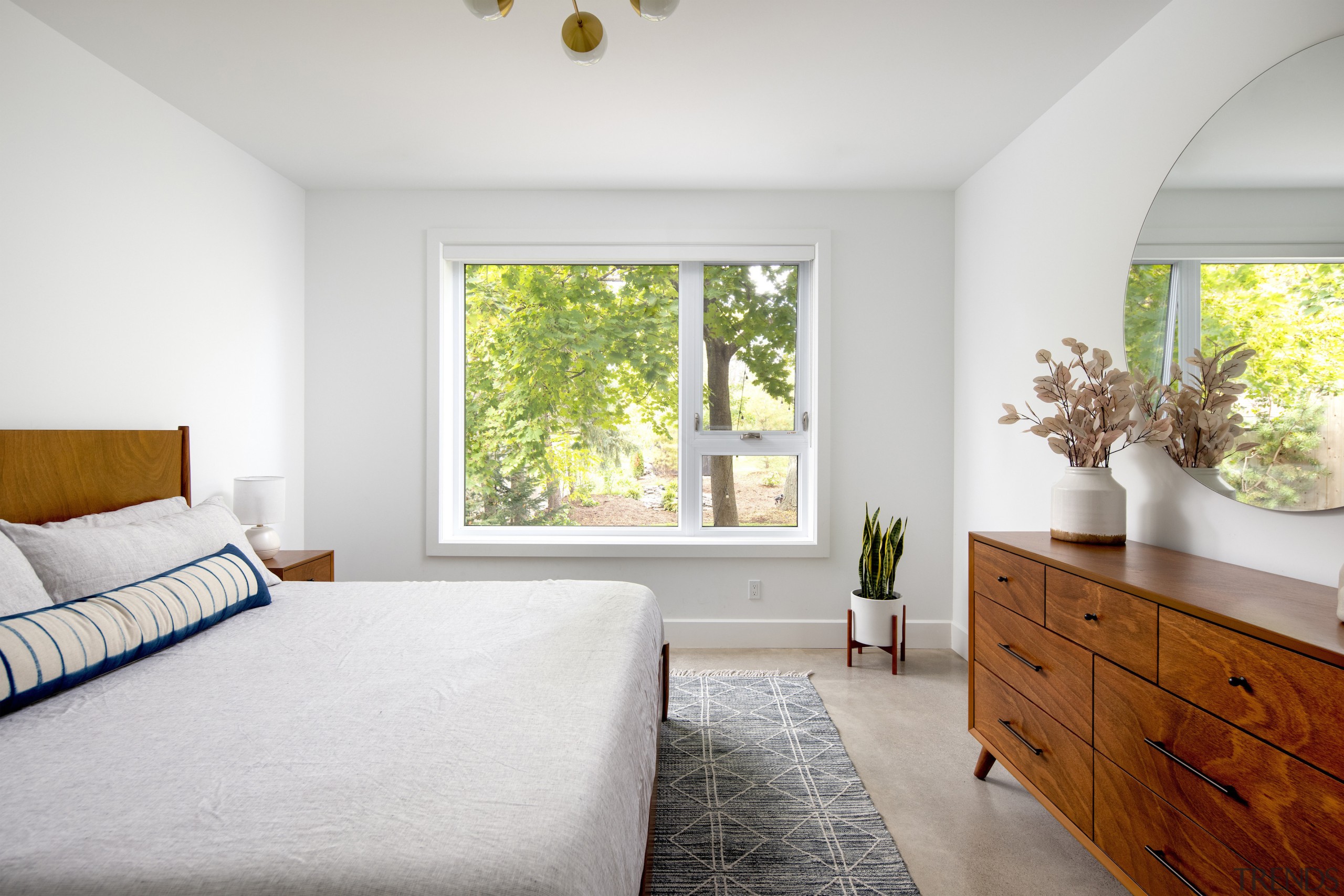 The somewhat removed master bedroom is white, light 