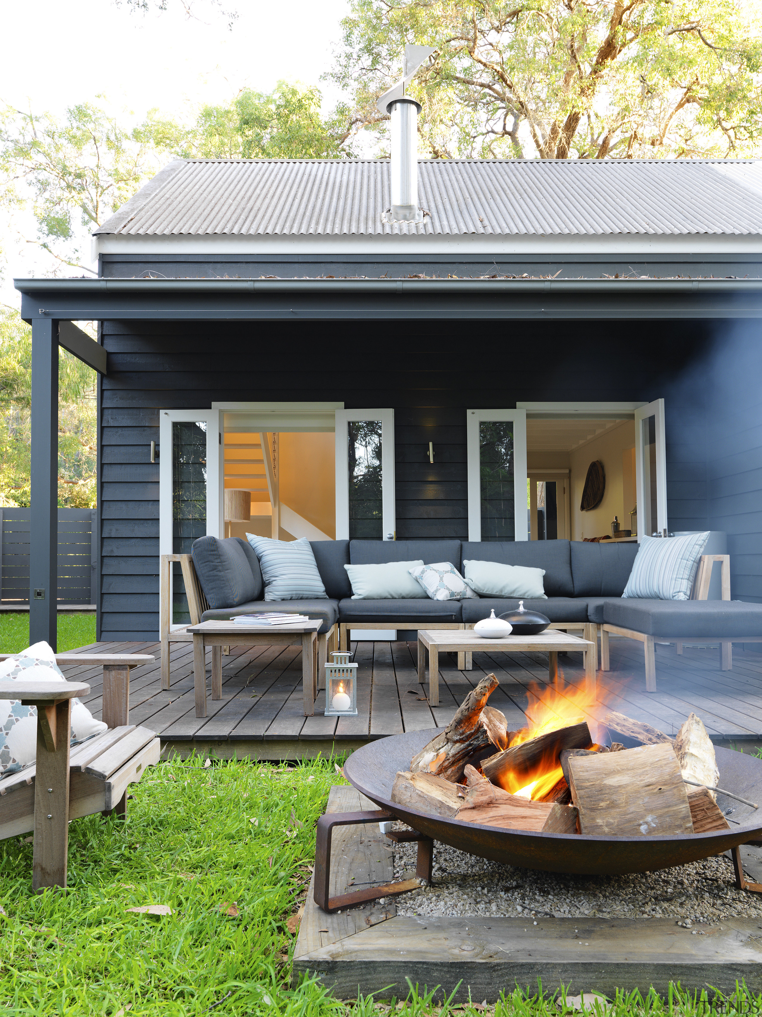 This house was renovated by Connor &amp; Solomon backyard, home, house, outdoor structure, real estate, yard, white