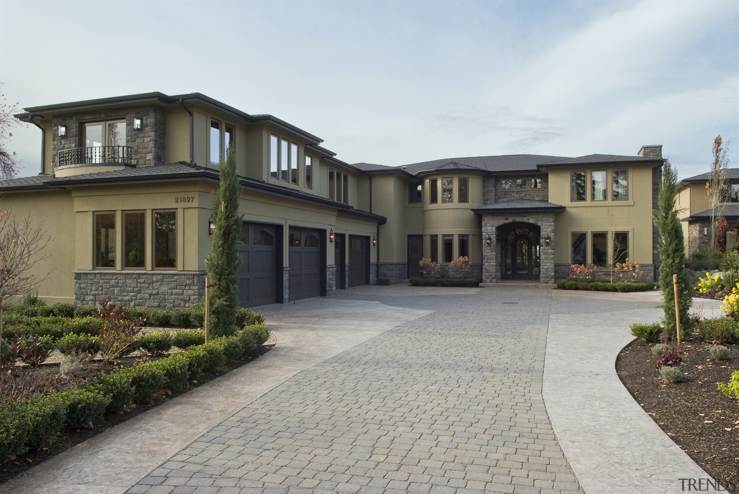 Images of the exterior of this home with building, cottage, courtyard, driveway, estate, facade, home, house, mansion, property, real estate, residential area, walkway, window, gray, white