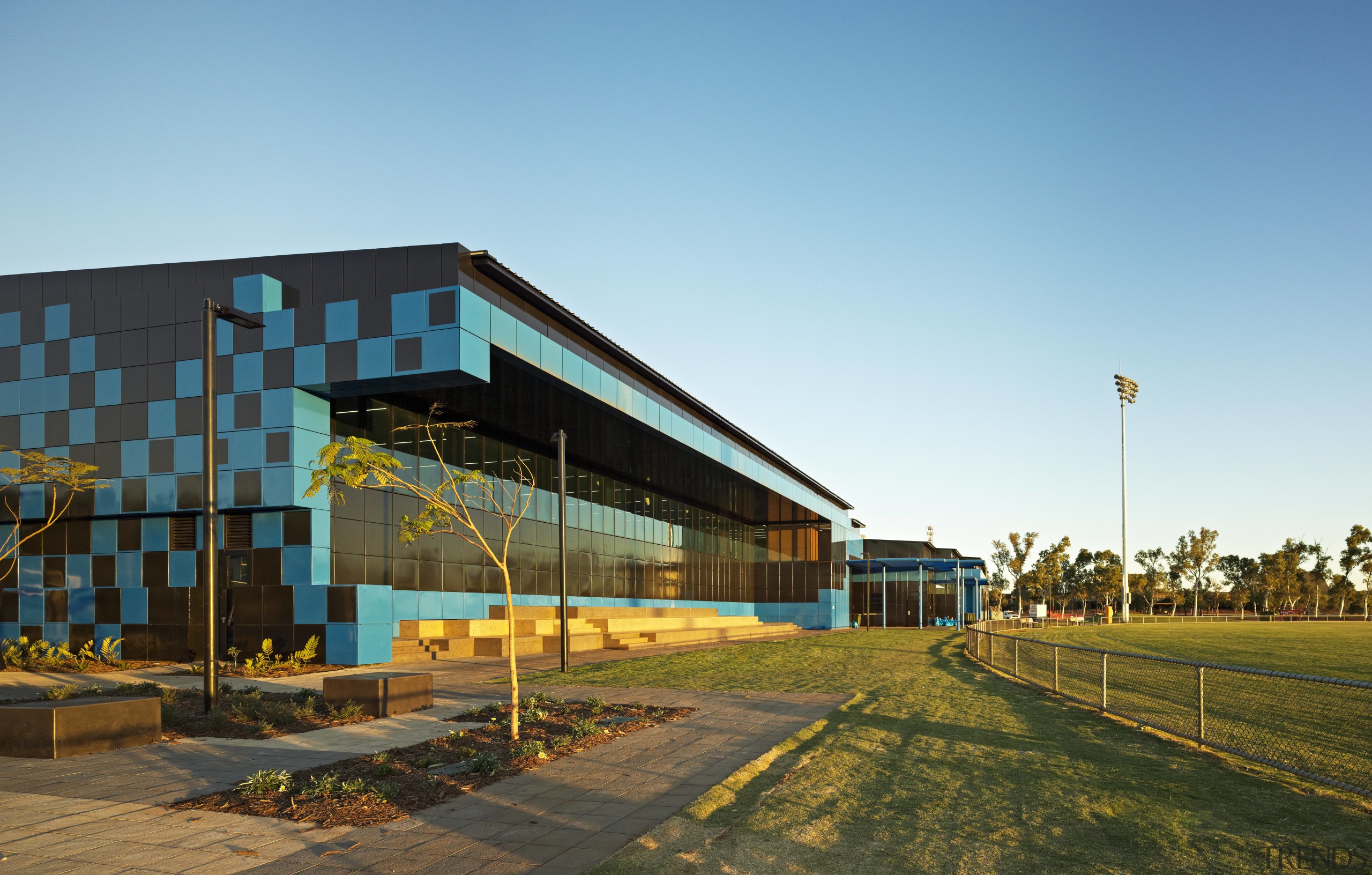 Desert storm  Wanangkura Stadium by ARM Architecture architecture, building, corporate headquarters, facade, mixed use, real estate, residential area, sky, structure, transport, teal, brown