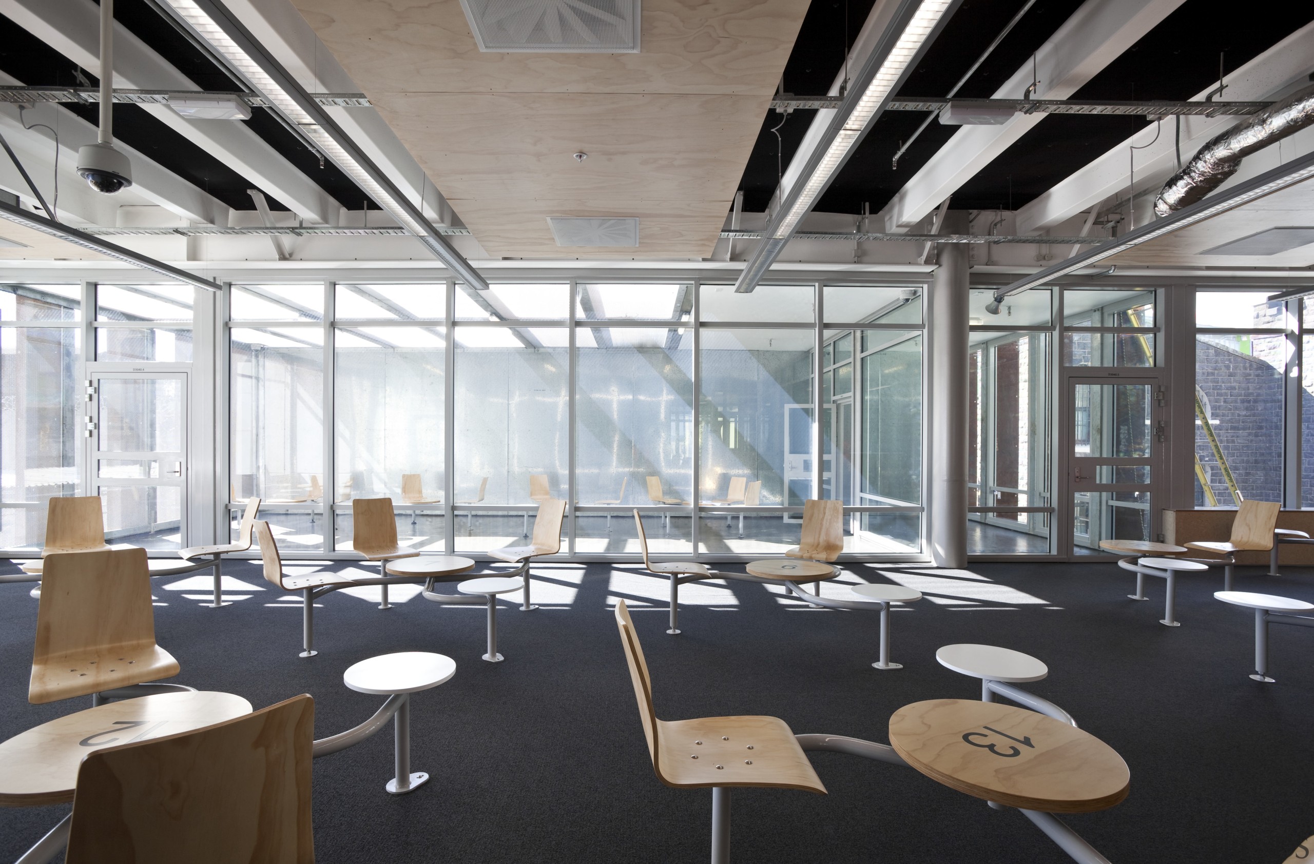 View of the Mt Eden Corrections Facility. - architecture, ceiling, conference hall, daylighting, interior design, office, white, black