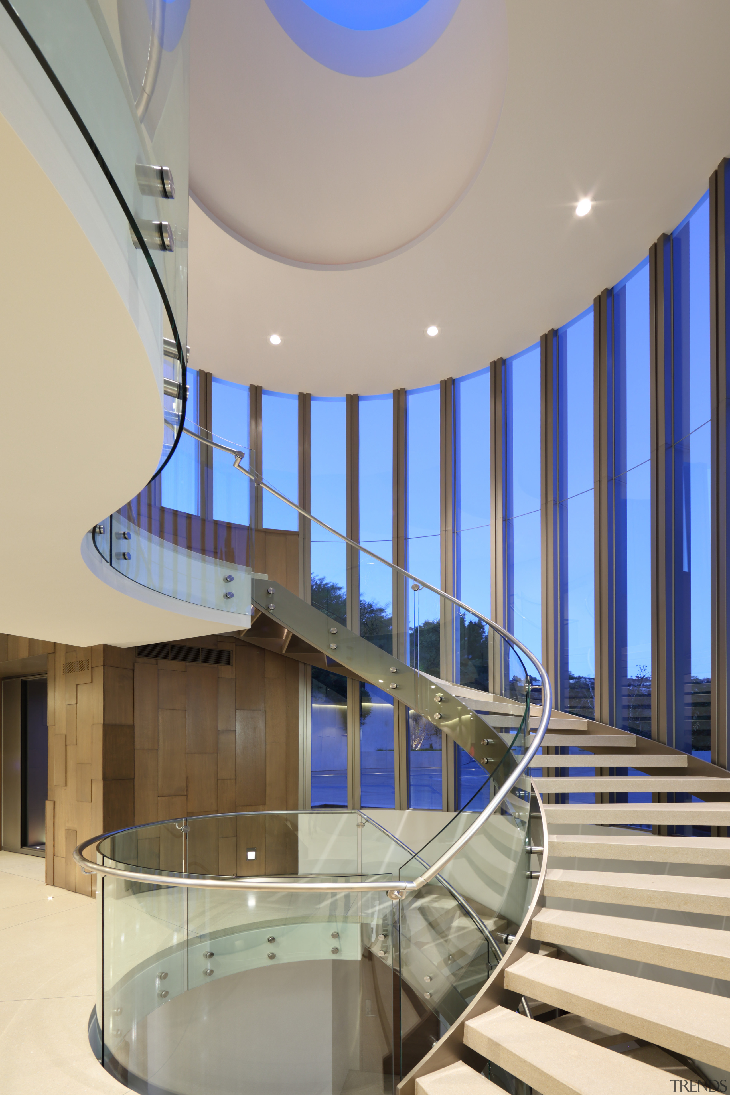 Nestled in the stair tower seen from the apartment, architecture, ceiling, daylighting, estate, glass, handrail, interior design, leisure centre, lobby, real estate, stairs, structure, gray