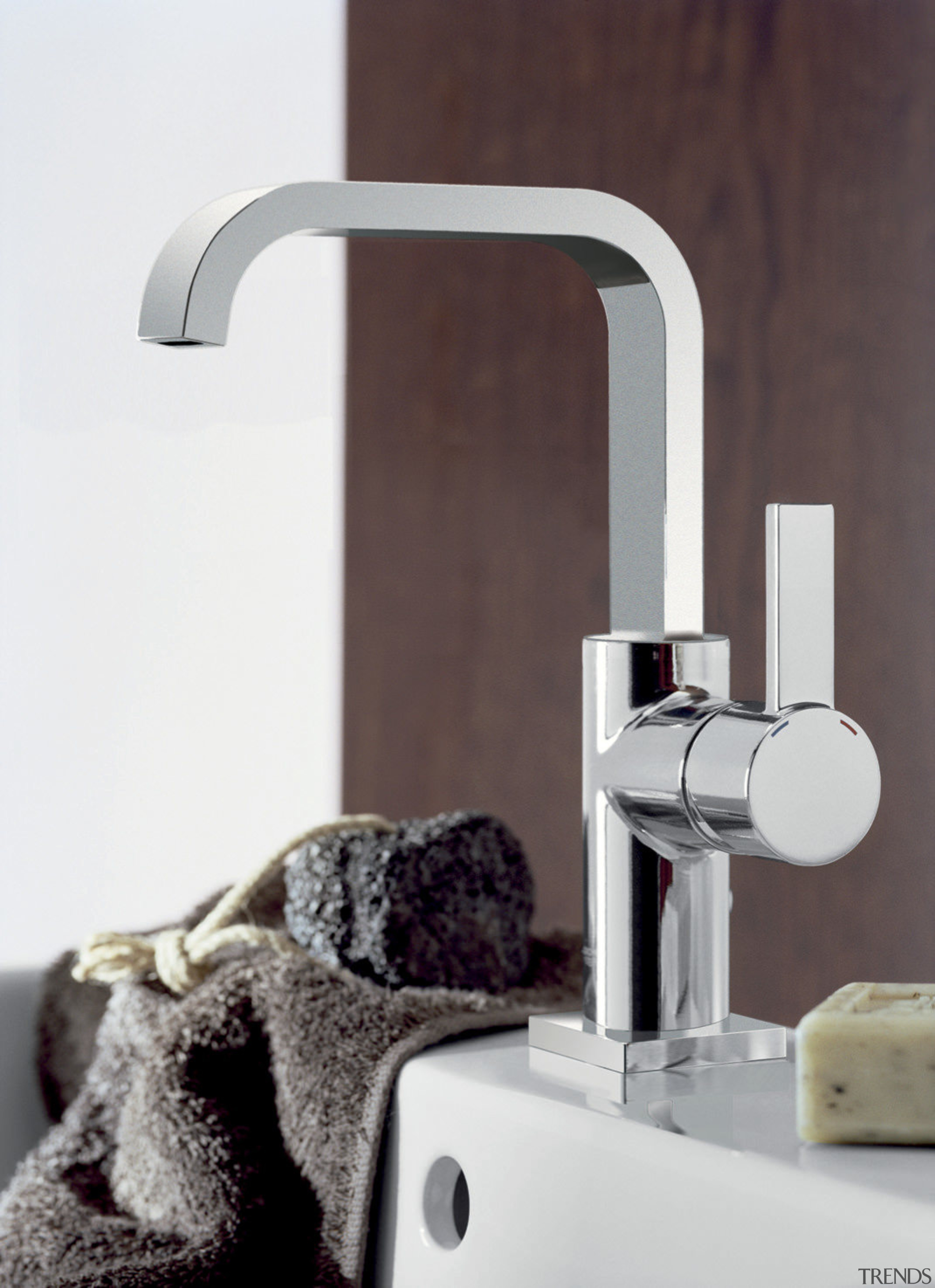 Grohe ceramic discs provide prescision operation. - Grohe plumbing fixture, product design, tap, white, red