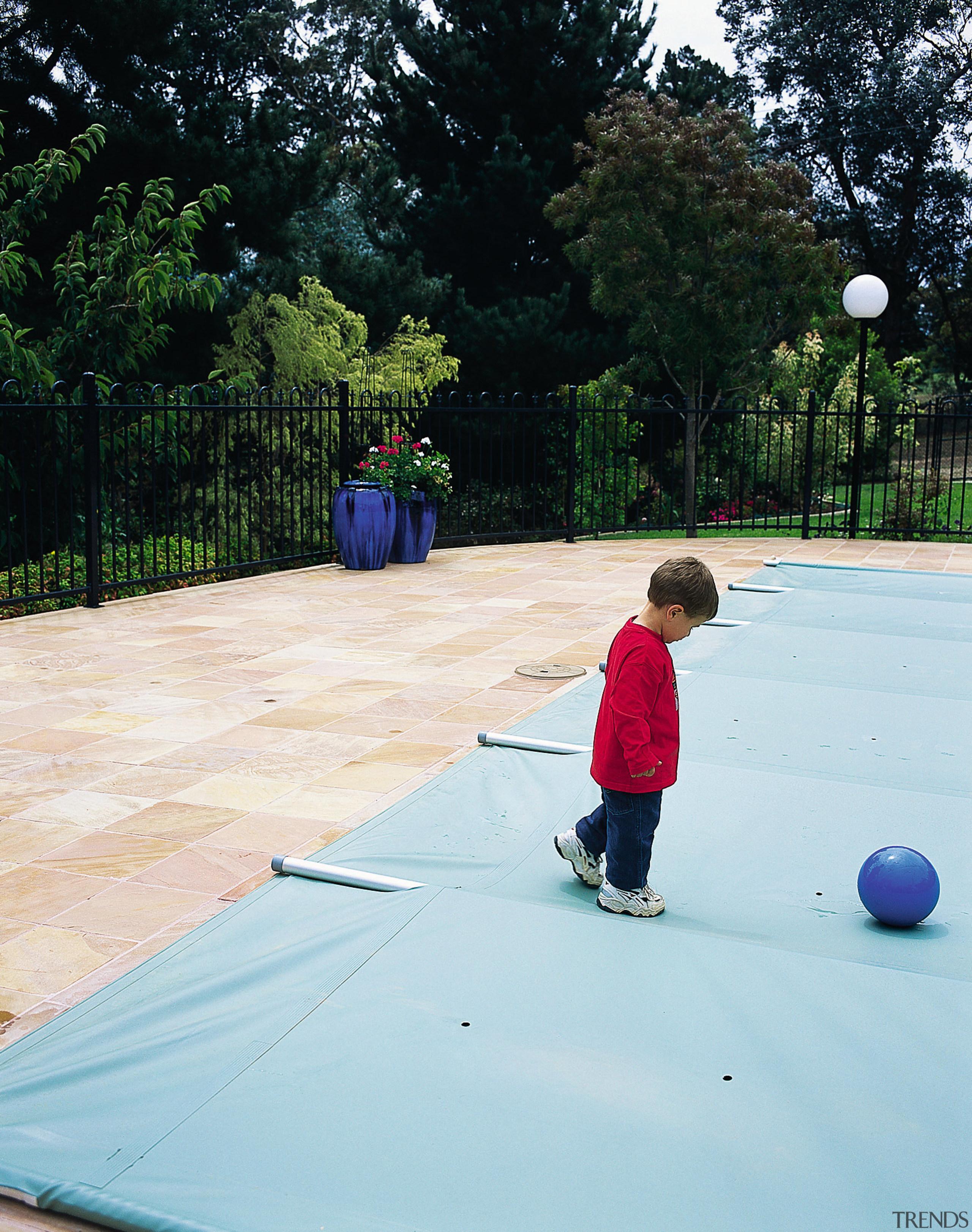 View of automatic pool covers by GB Pool child, fun, grass, green, leisure, outdoor structure, plant, play, public space, recreation, tree, vacation, white, black