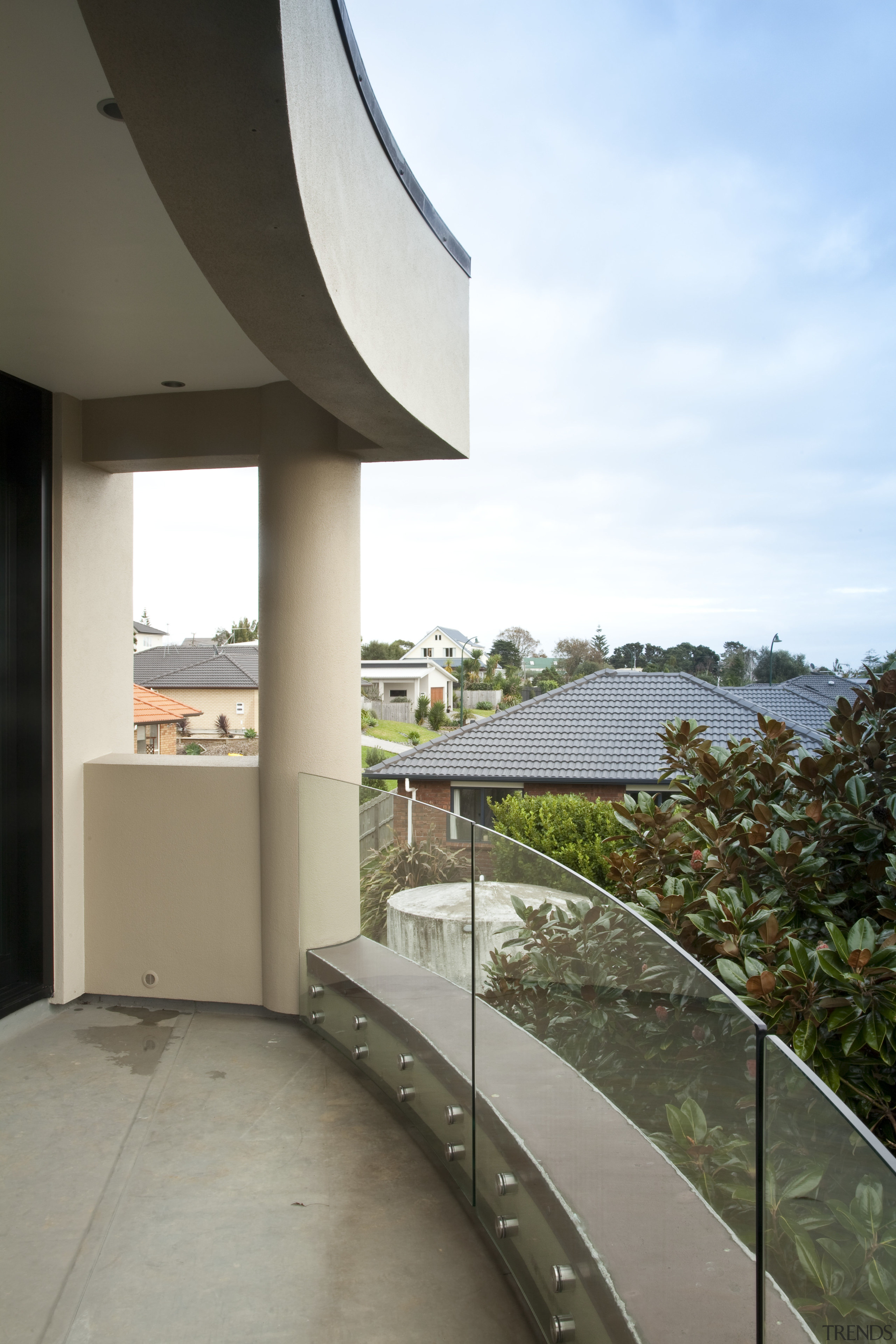 View of home with curved, toughened glass balustrade. apartment, architecture, balcony, building, condominium, daylighting, estate, house, property, real estate, sky, white