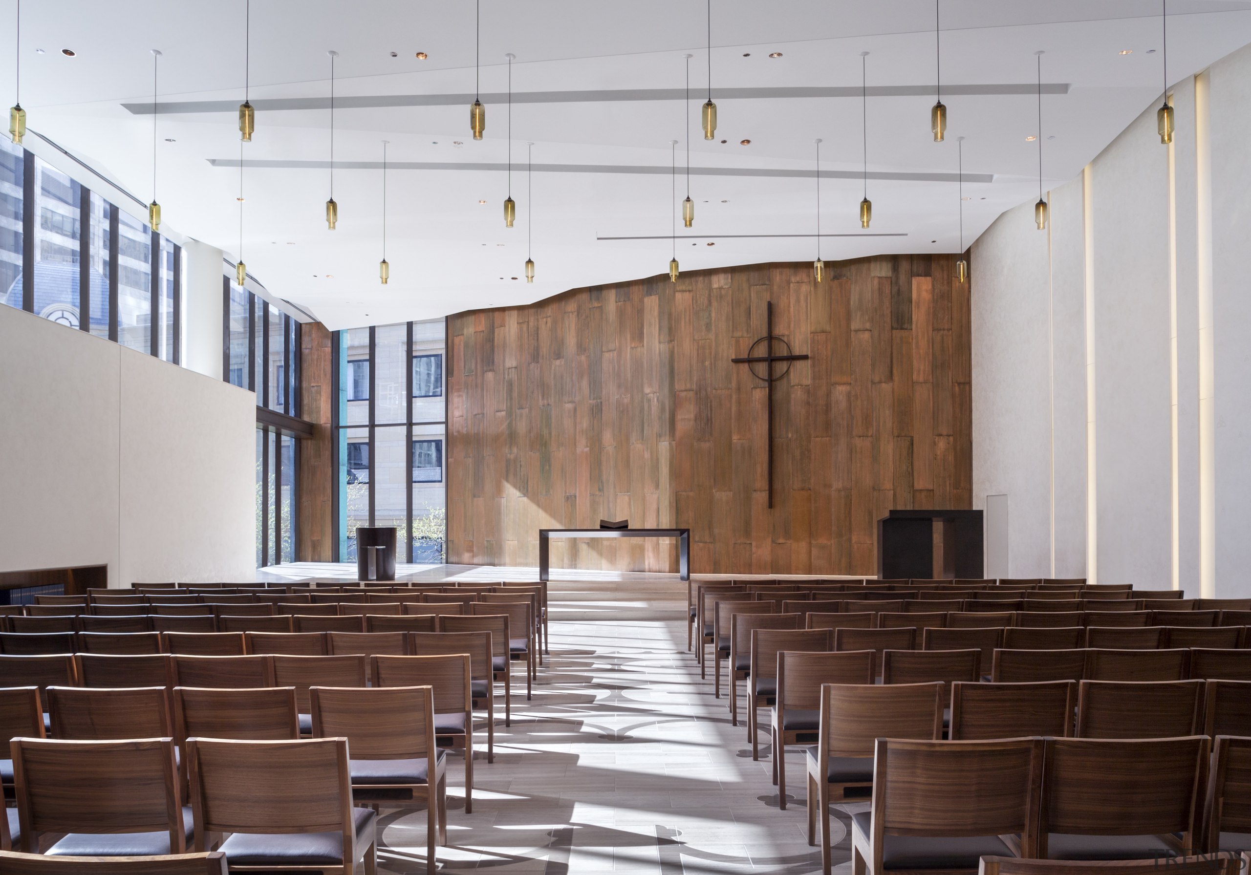 A copper wall features on the inside of architecture, auditorium, conference hall, furniture, interior design, gray