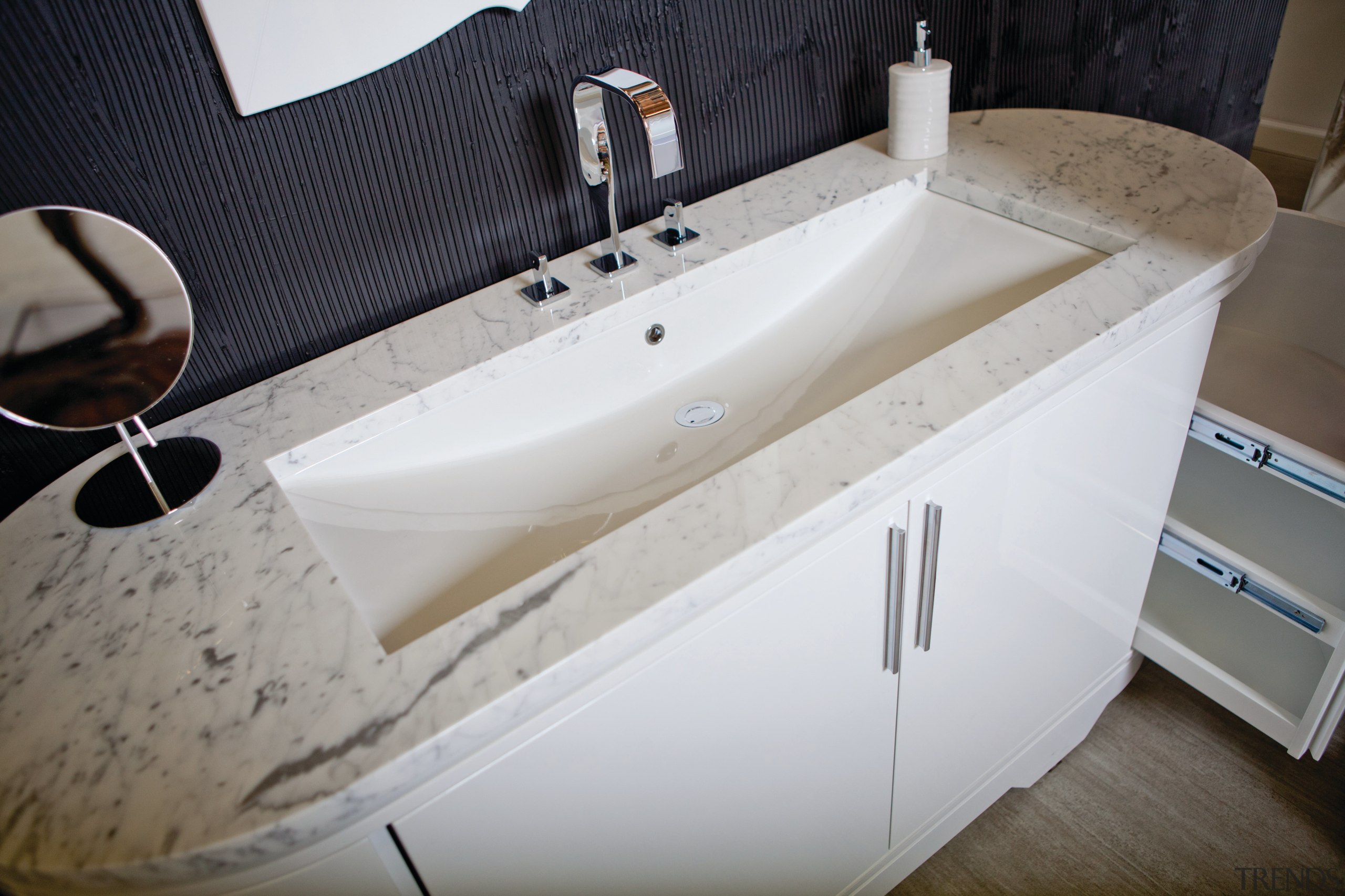 Lacava creates distinctive bathroom ware, such as the bathroom, bathroom sink, bathtub, floor, plumbing fixture, product design, sink, tap, gray, white