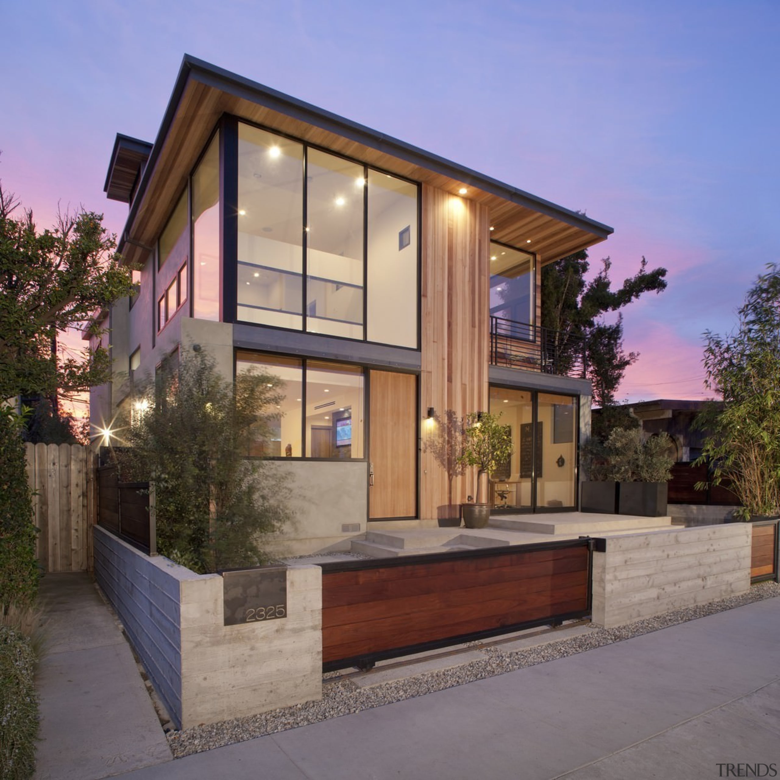 Outside, the home is inviting, with substantial windows architecture, elevation, estate, facade, home, house, property, real estate, residential area, siding, window, gray