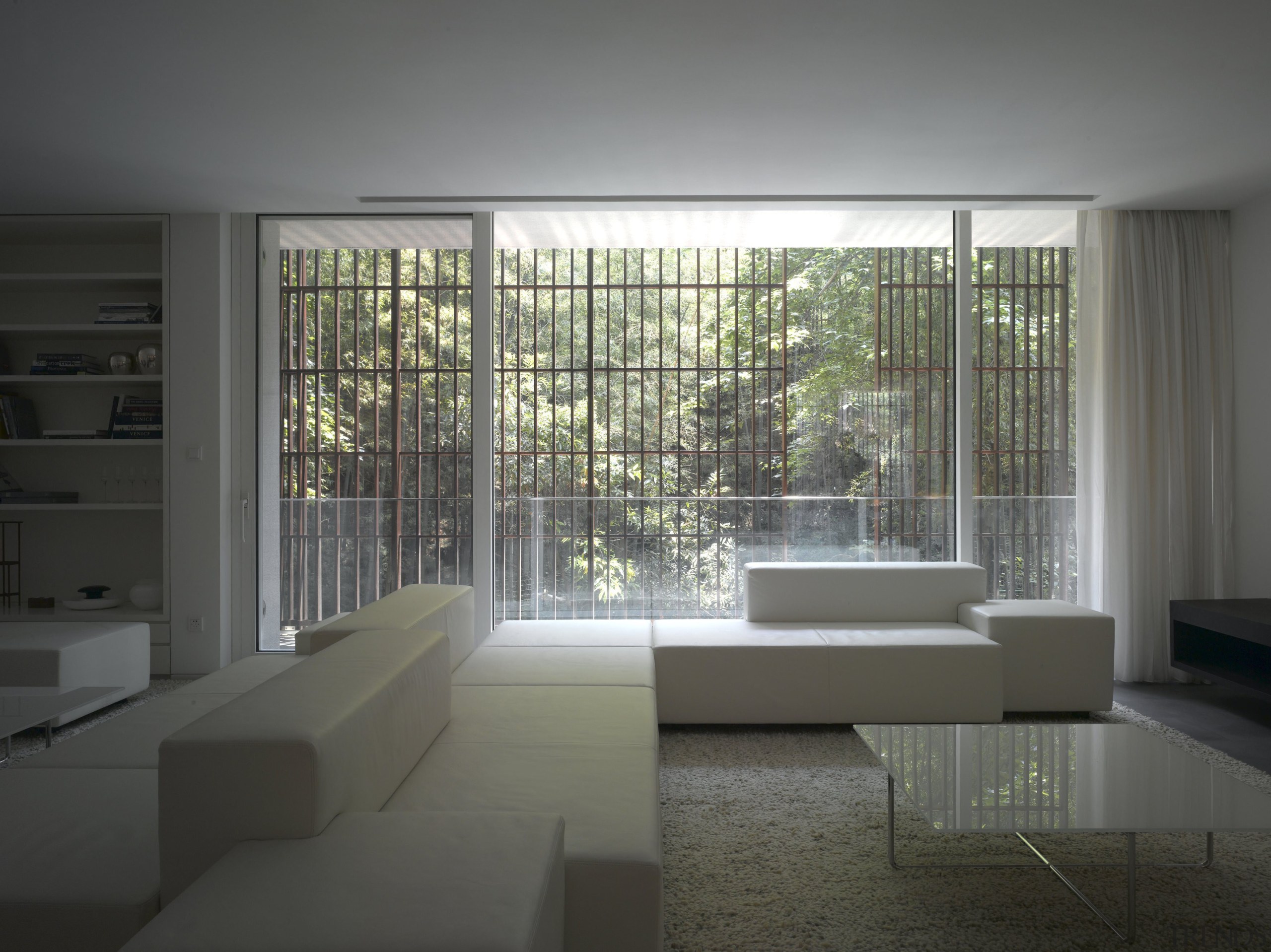 View of apartment living area with couches, rug, architecture, condominium, daylighting, glass, house, interior design, window, gray, black