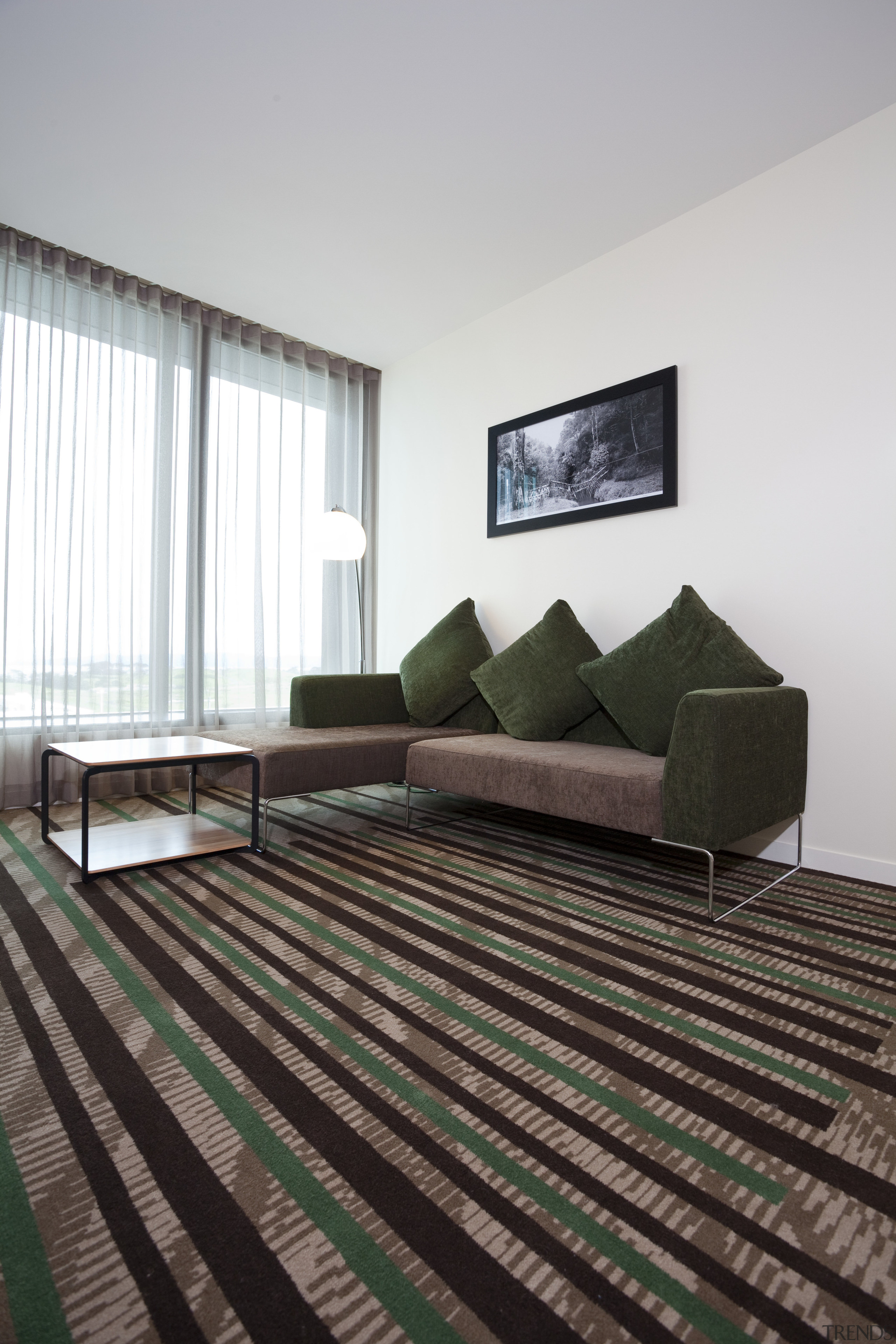 Interior of the Novotel Auckland Airport. Carpets supplied architecture, daylighting, floor, flooring, interior design, real estate, room, white