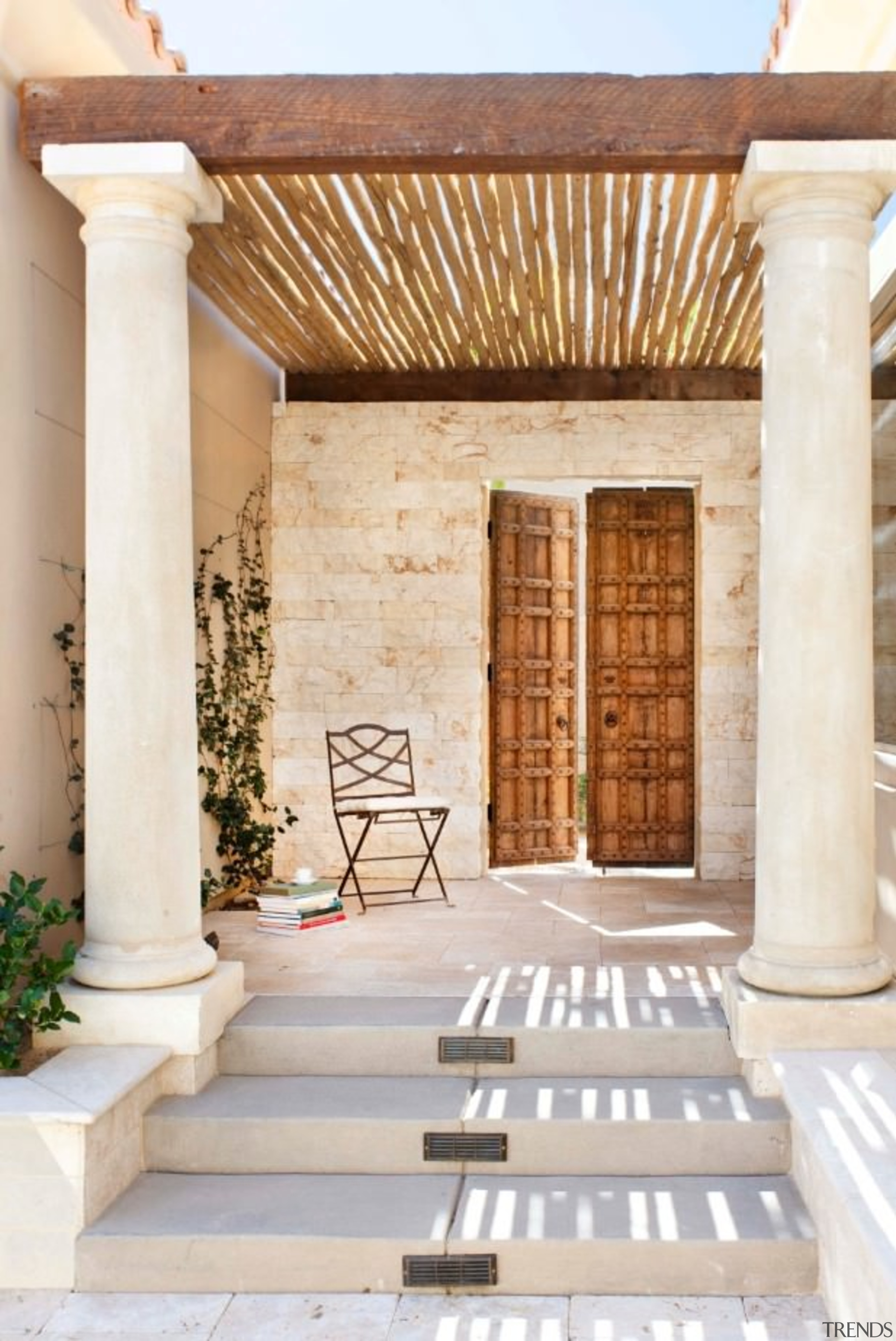 The European influences are clear in this entryway, column, estate, property, real estate, structure, white