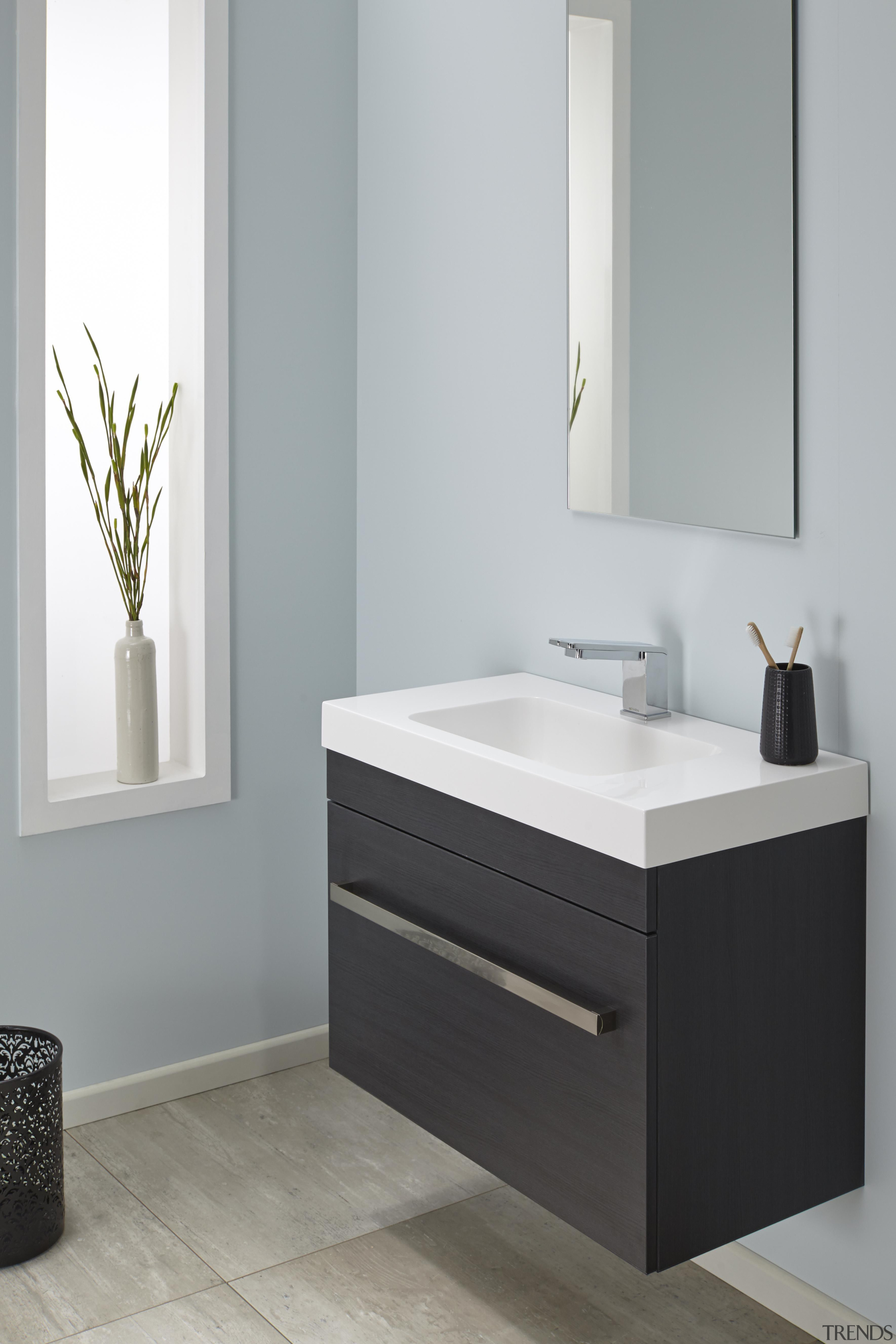 Soft basin corners and thick external lines give angle, bathroom, bathroom accessory, bathroom cabinet, bathroom sink, chest of drawers, drawer, floor, furniture, plumbing fixture, product, product design, sink, tap, gray
