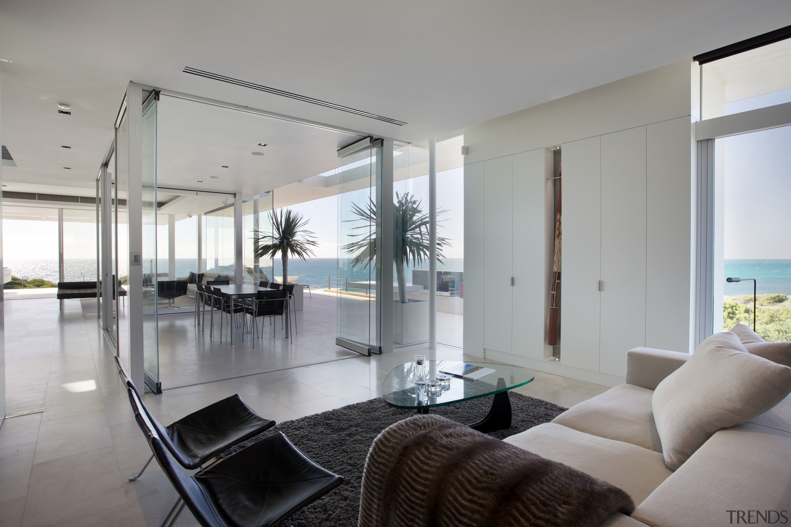 The shape of this beachside site allowed most apartment, architecture, ceiling, condominium, house, interior design, living room, penthouse apartment, property, real estate, window, gray