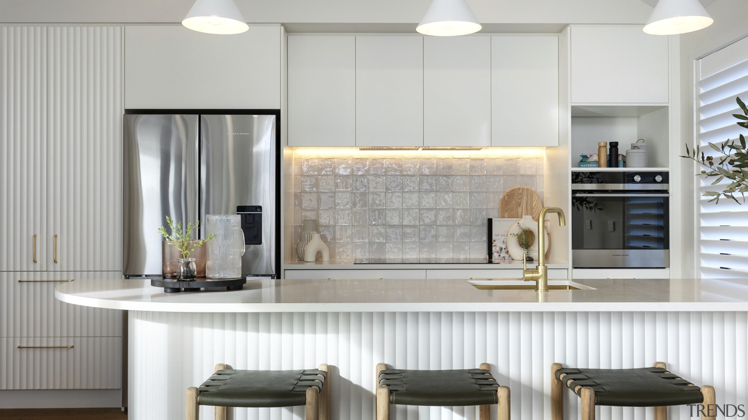 The contemporary kitchen includes a wealth of storage 