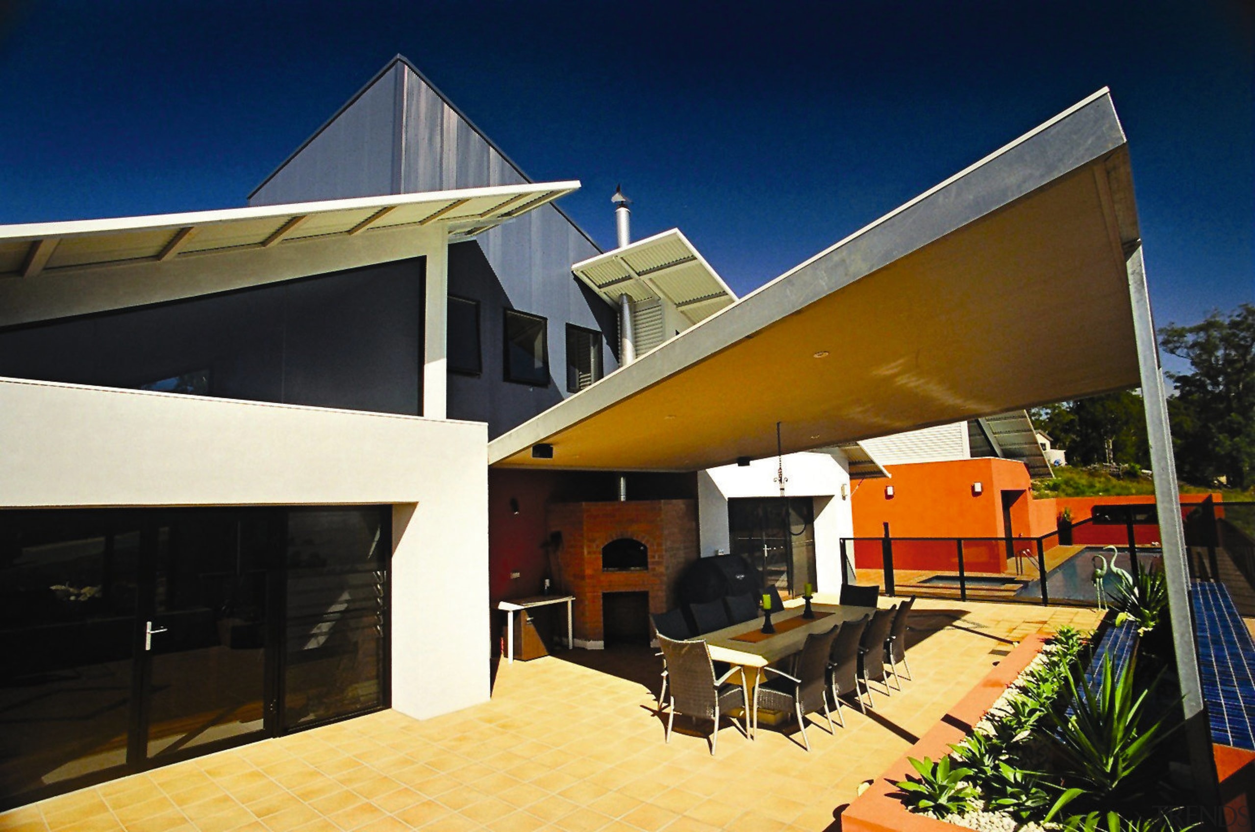 Large covered outdoor area of home, with dining architecture, facade, home, house, real estate, roof