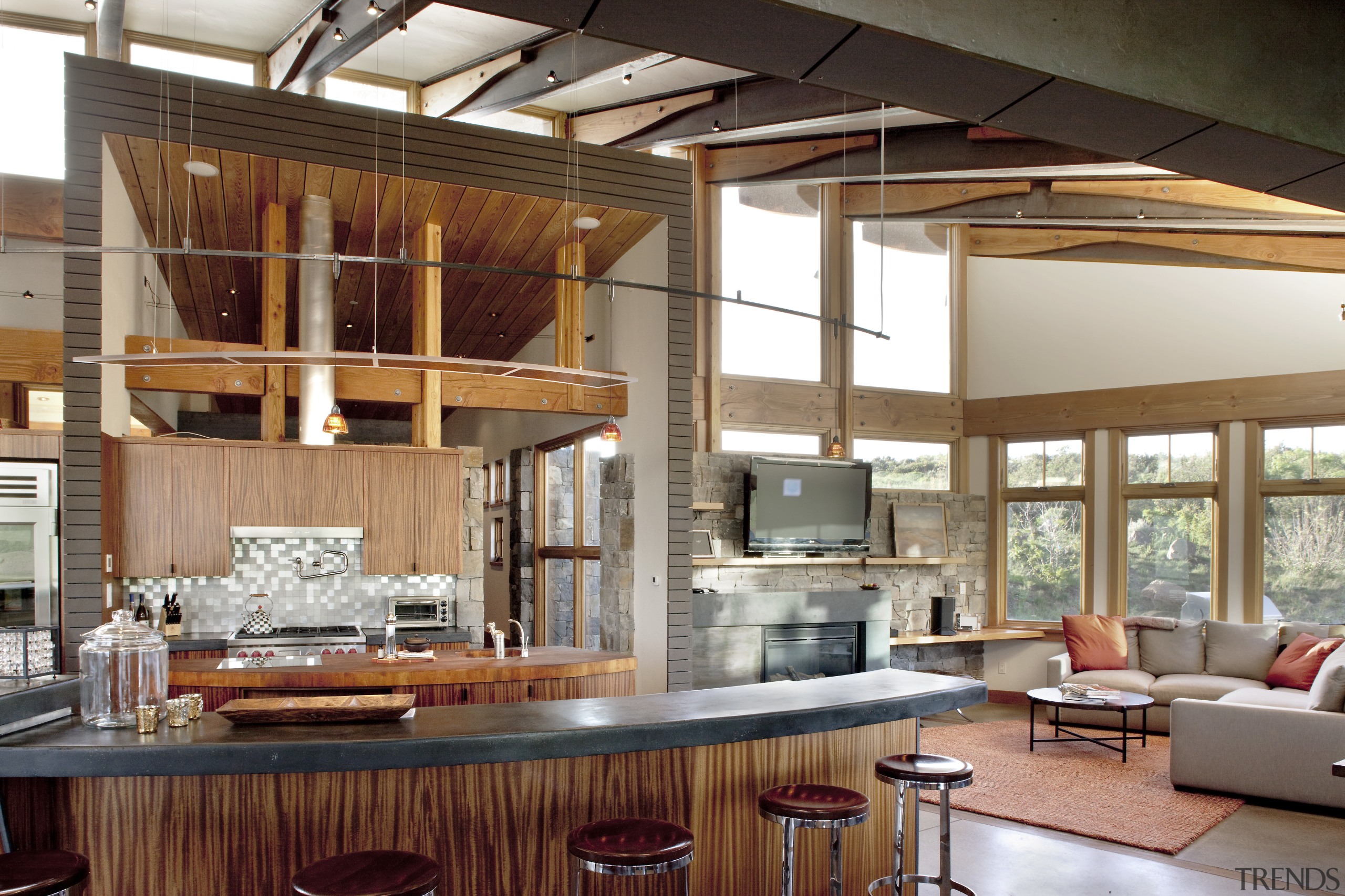 A view of the kitchen and lounge areas ceiling, countertop, interior design, kitchen, brown