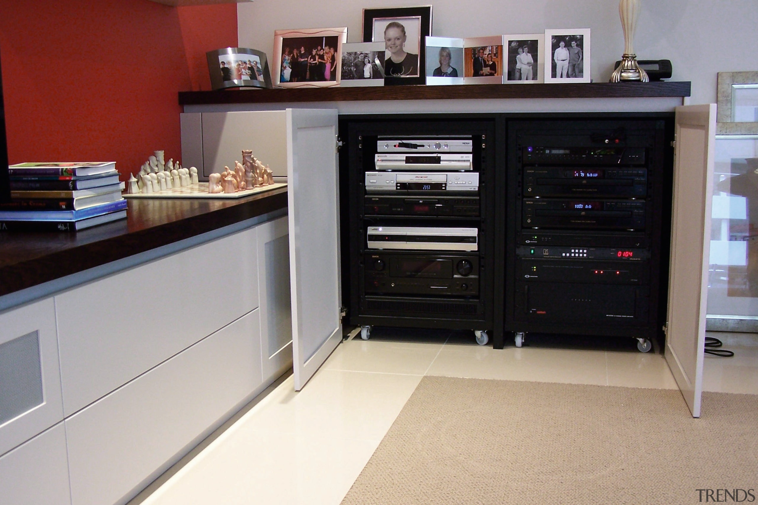 A view of some cabinetry with the audio furniture, home appliance, kitchen, kitchen appliance, gray