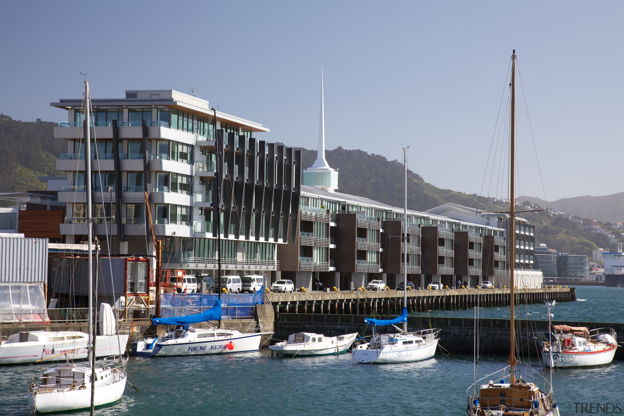 The design of the Clyde Quay Wharf development boat, building, city, condominium, dock, harbor, marina, port, sea, sky, water, water transportation, watercraft, teal