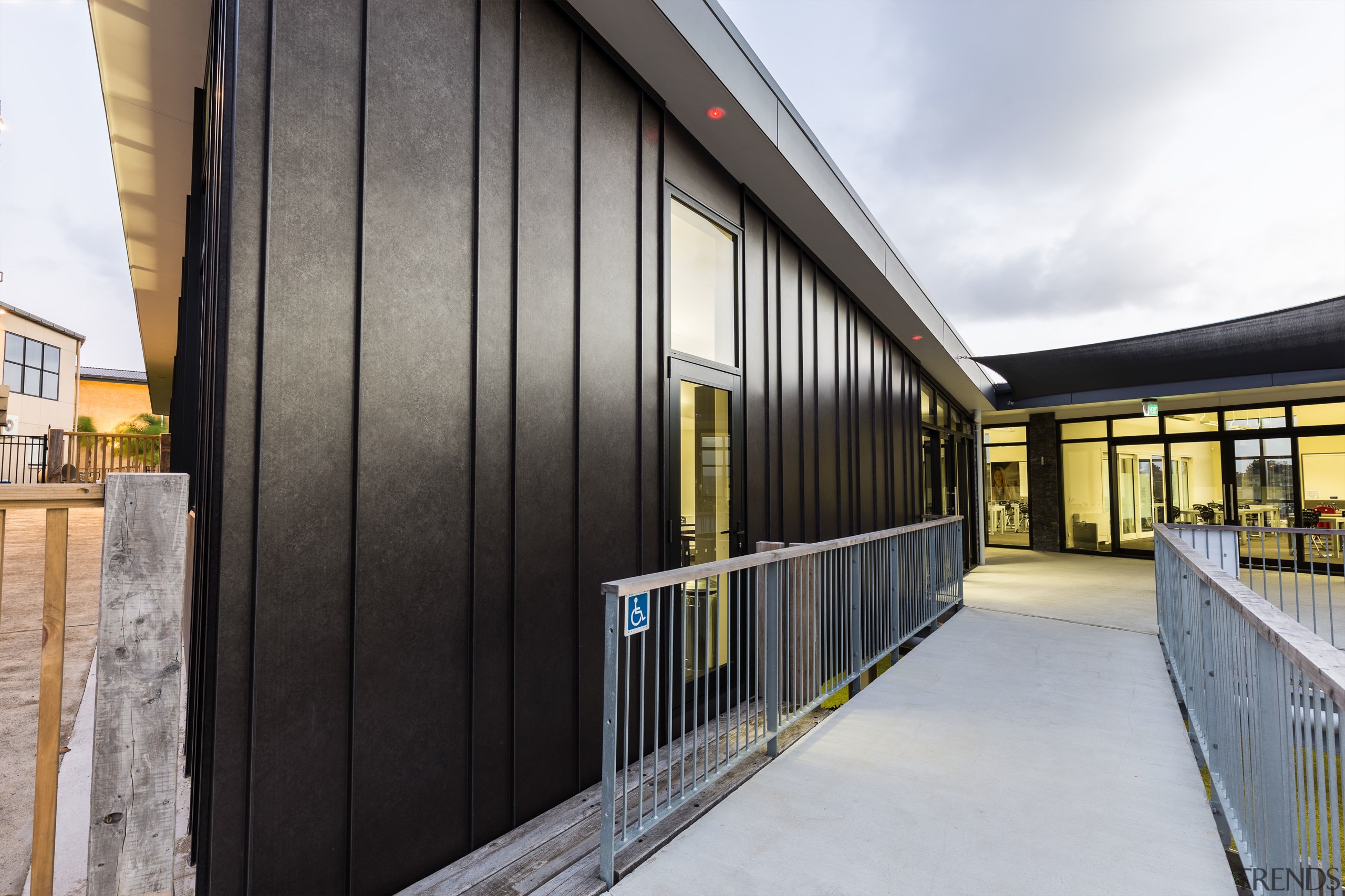 The panelling between the standing seam elements on architecture, building, facade, house, real estate, gray, black, white