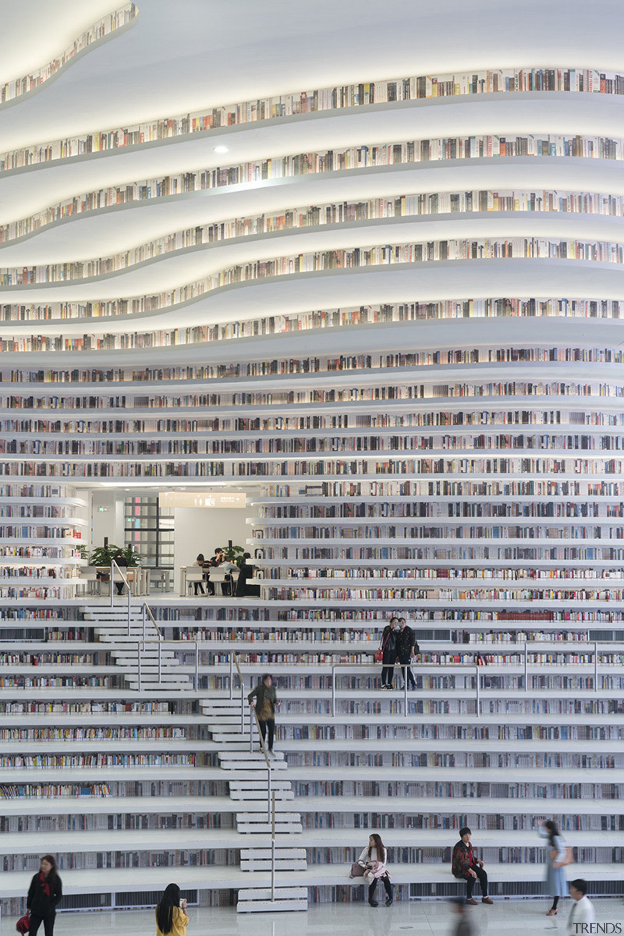 The Tianjin Binhai Library holds 1.2 million books. building, sport venue, structure, gray, white