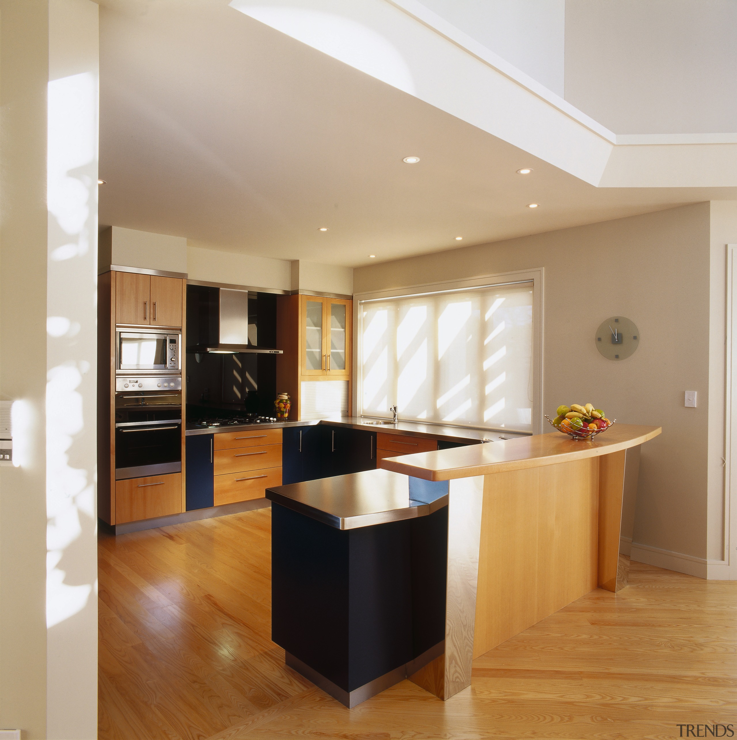 Kitchen with dark blue and contrasting light timber cabinetry, ceiling, countertop, cuisine classique, floor, flooring, hardwood, interior design, kitchen, laminate flooring, real estate, room, wood flooring, gray