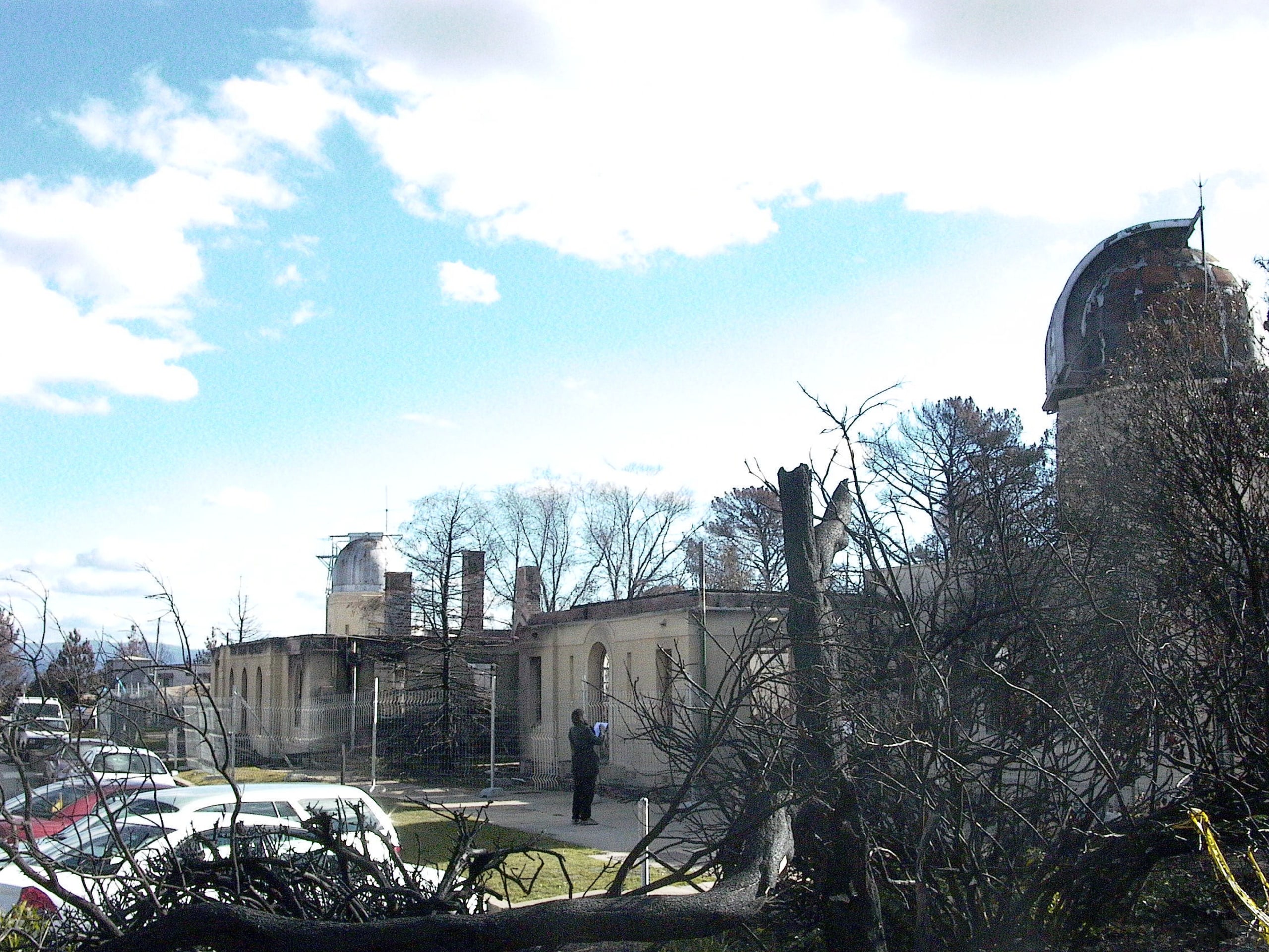 View of the observatory prior to renovations after building, cloud, house, residential area, sky, town, tree, white, black