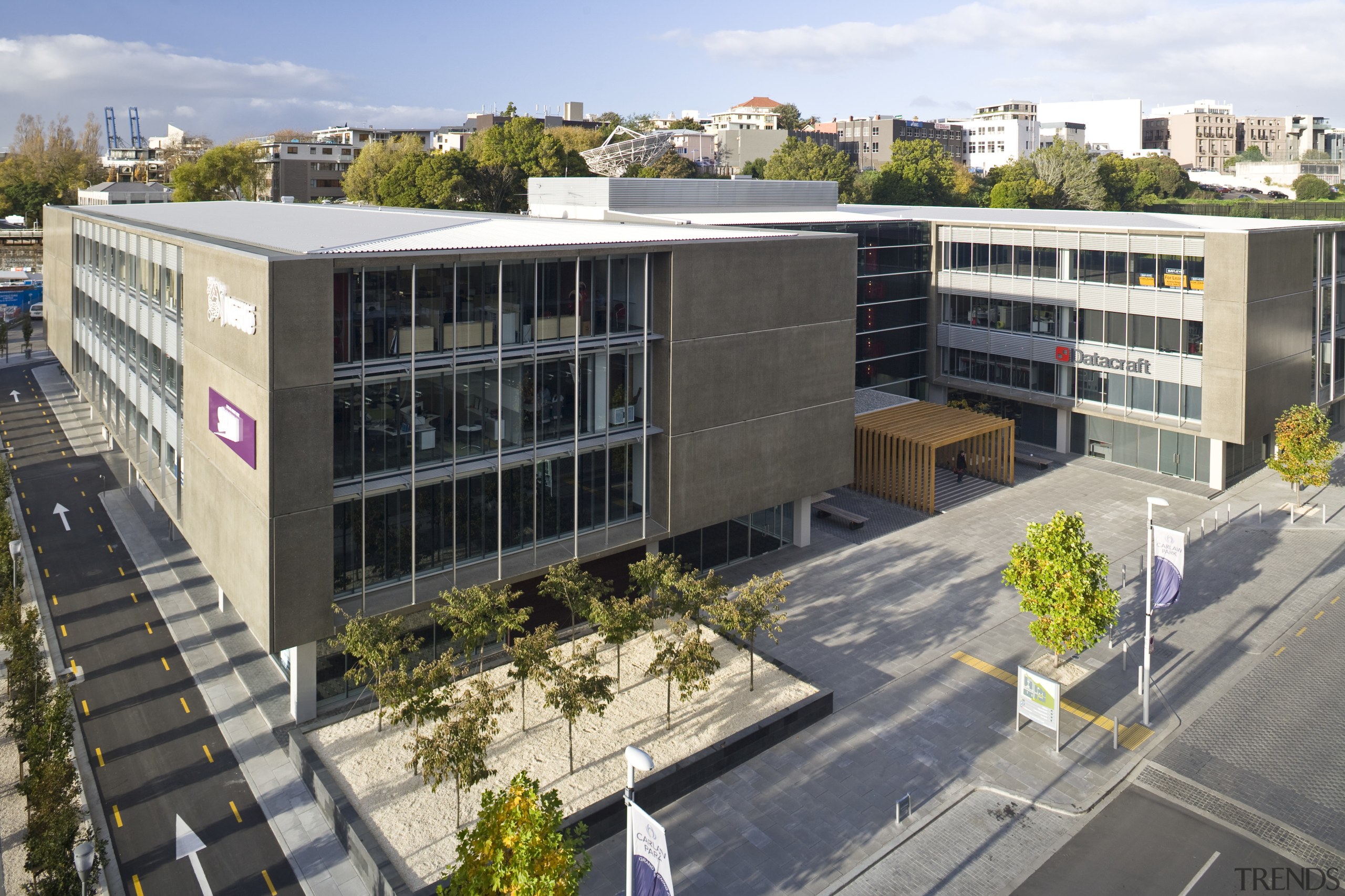 view of the main commercial building at Carlaw apartment, architecture, building, city, condominium, corporate headquarters, facade, headquarters, metropolitan area, mixed use, neighbourhood, real estate, residential area, urban design, white, gray