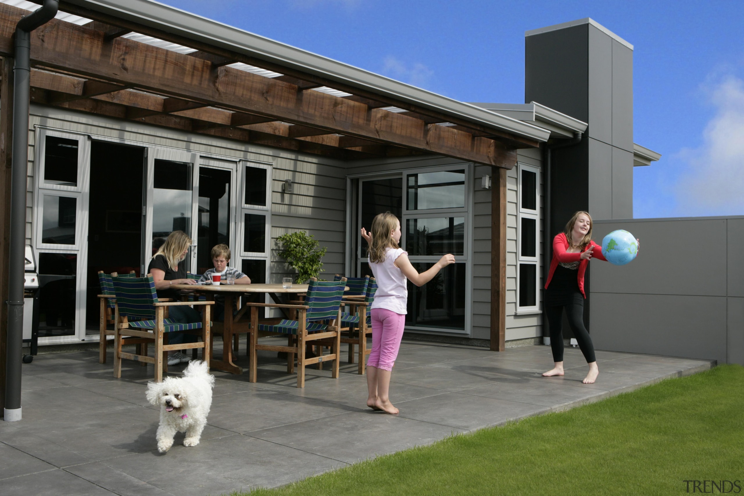 Functional kitchen in award winning 'Bridget' town house backyard, canopy, home, house, outdoor structure, recreation, shed, gray, black
