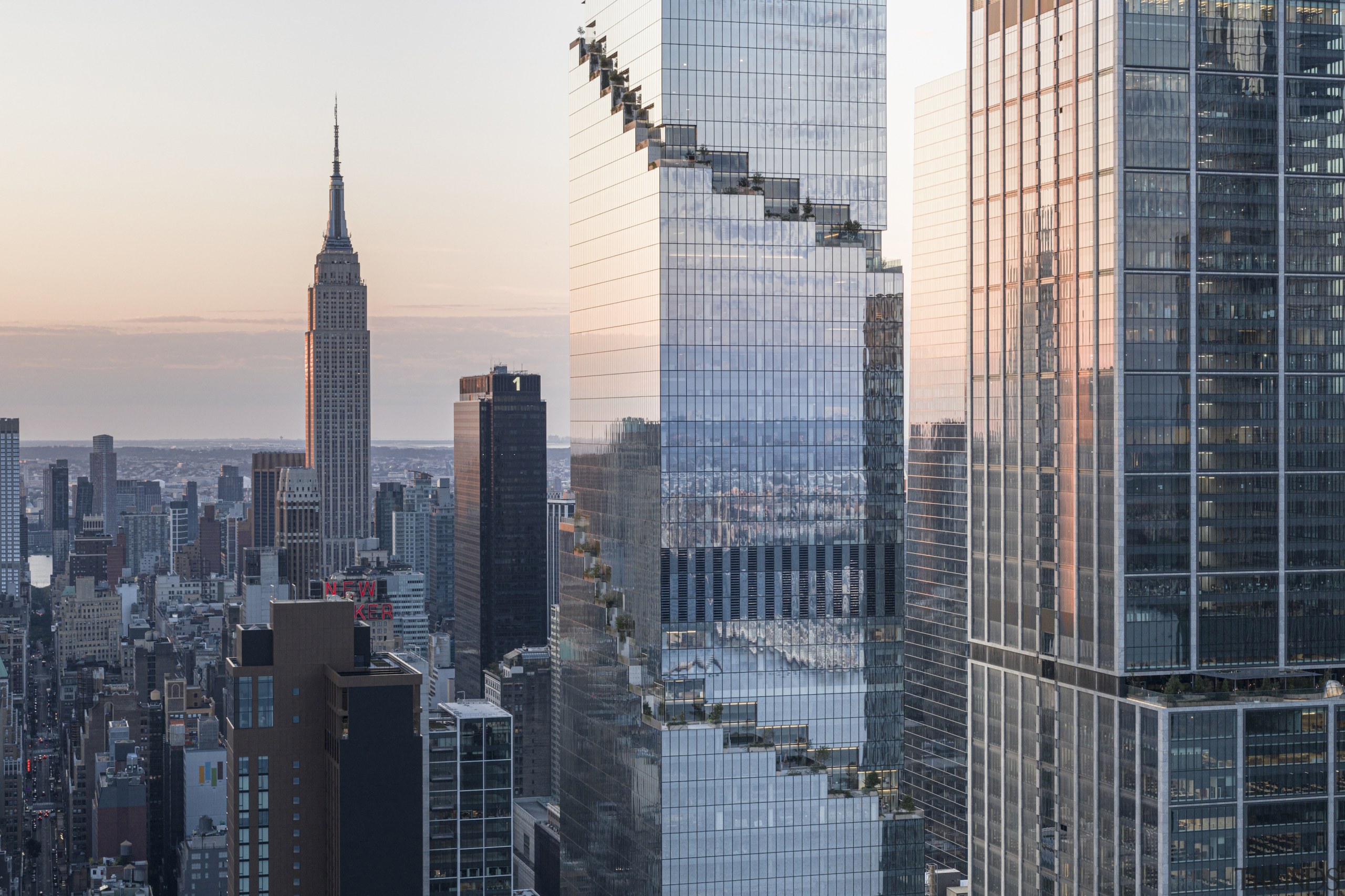 "The string of terraces wrapping around the building 