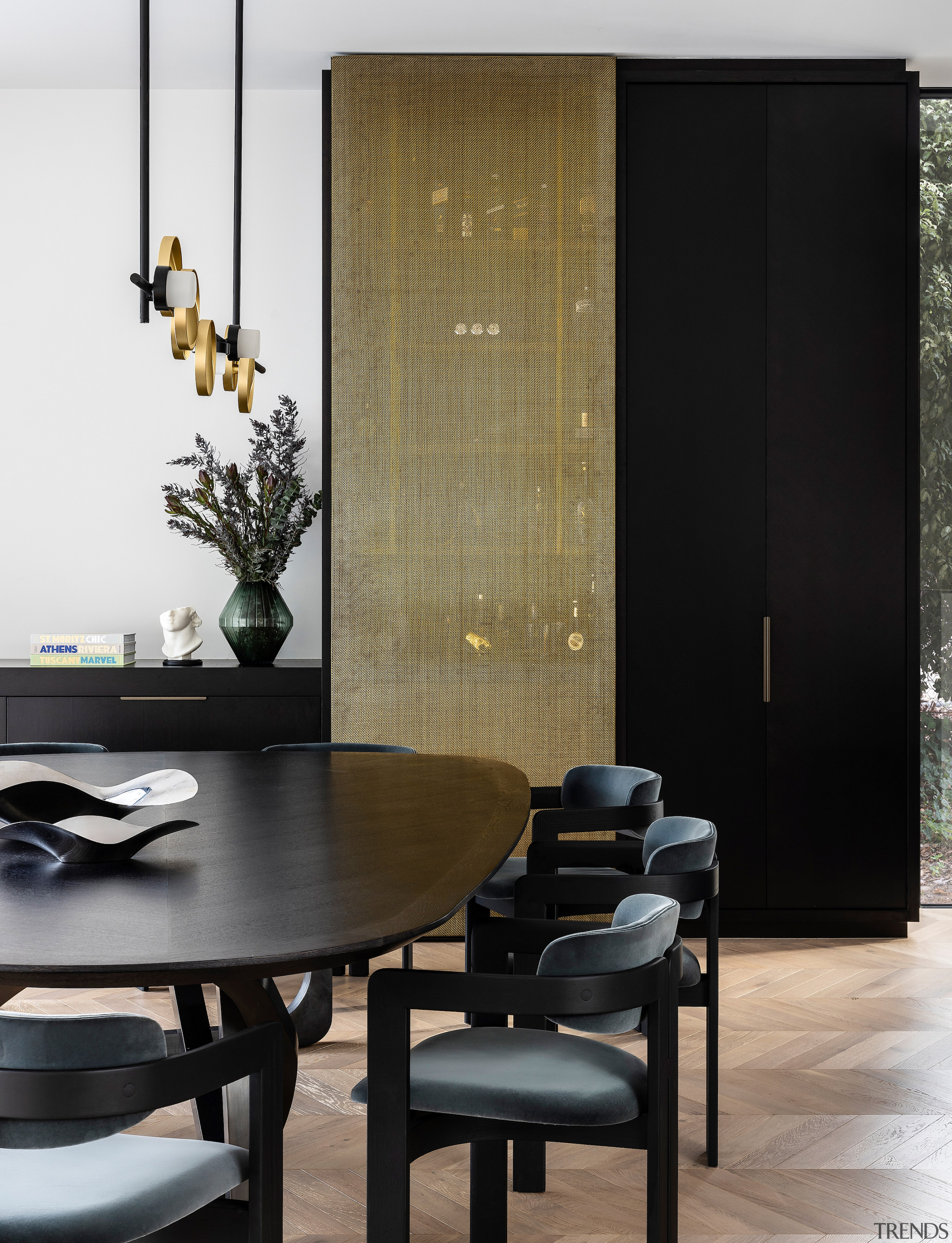 The 'cocktail bar' features a full height brass 