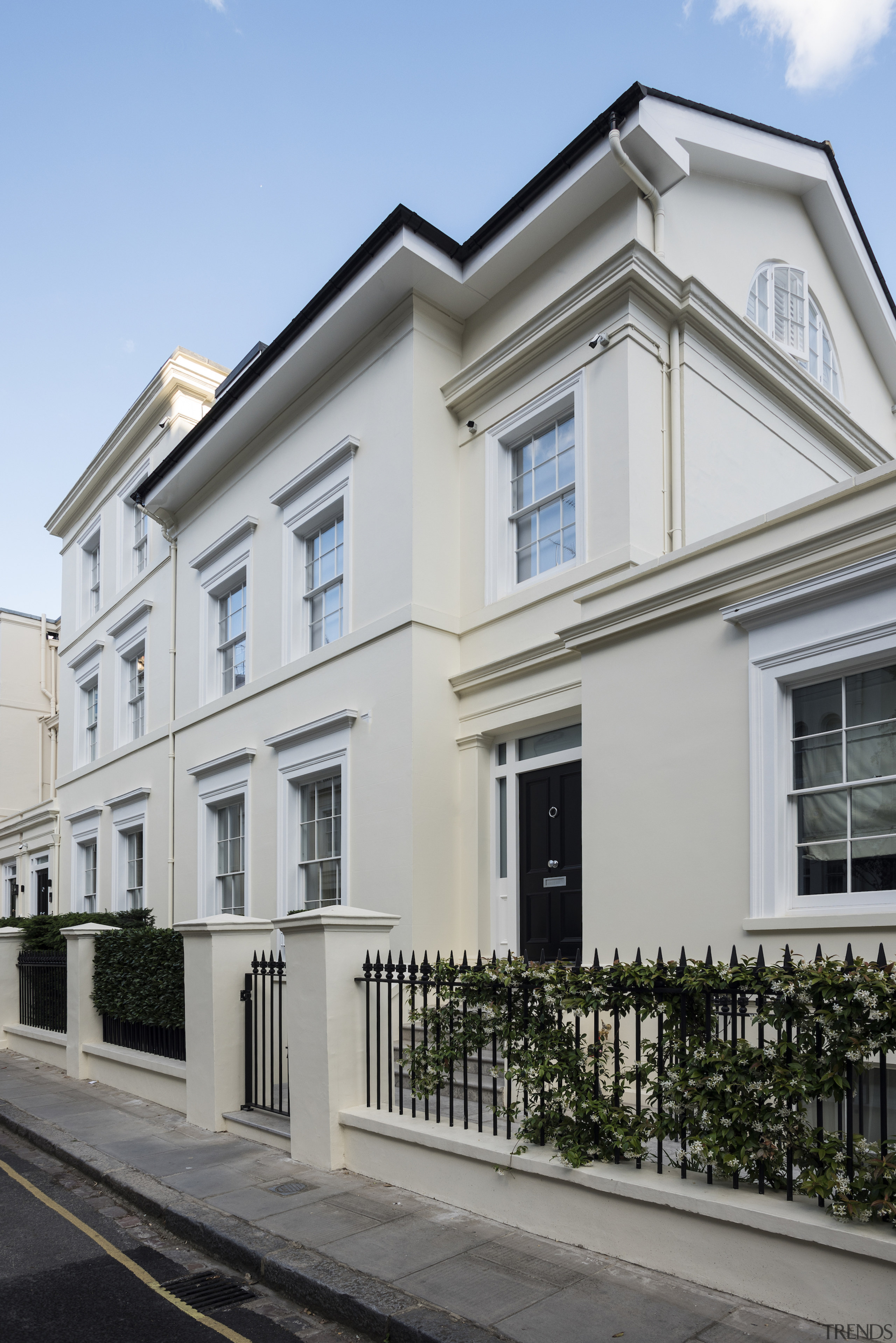 Traditional front doors to two townhouses in well-to-do 