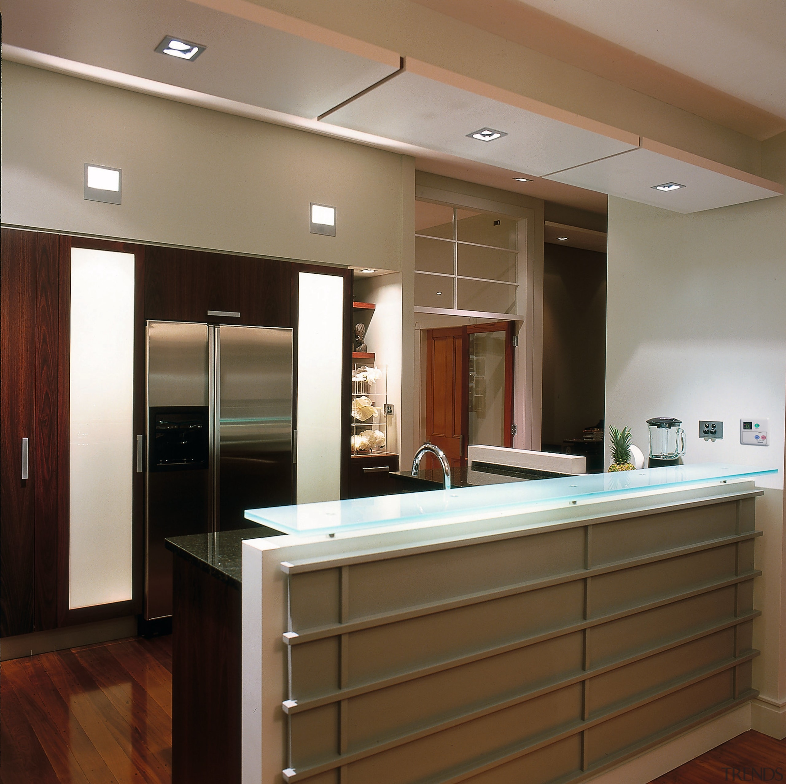 Kitchen with timber cabinetry, dark benchtop, with glass cabinetry, countertop, interior design, kitchen, brown, gray