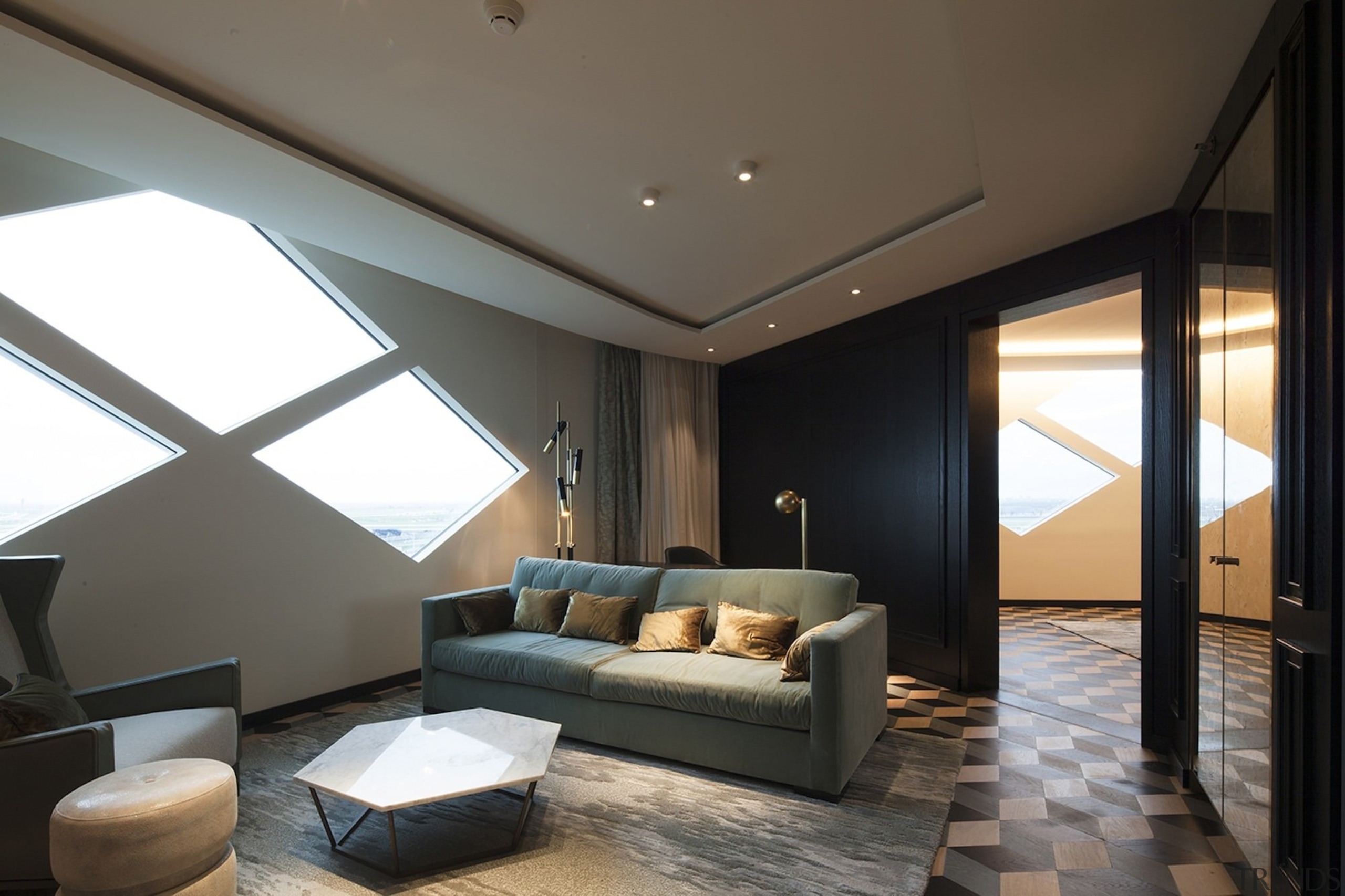 A view of one of the rooms with architecture, ceiling, daylighting, floor, interior design, living room, room, window, black, gray