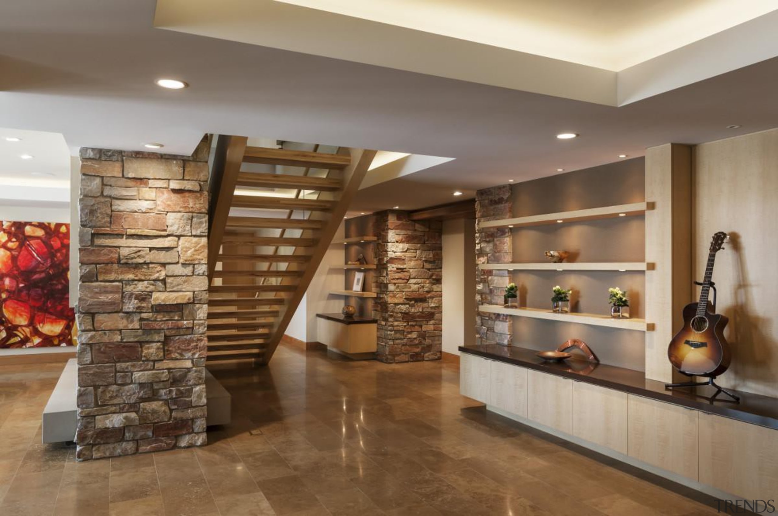 This new house, designed by Charles R Stinson floor, flooring, interior design, lobby, brown, gray