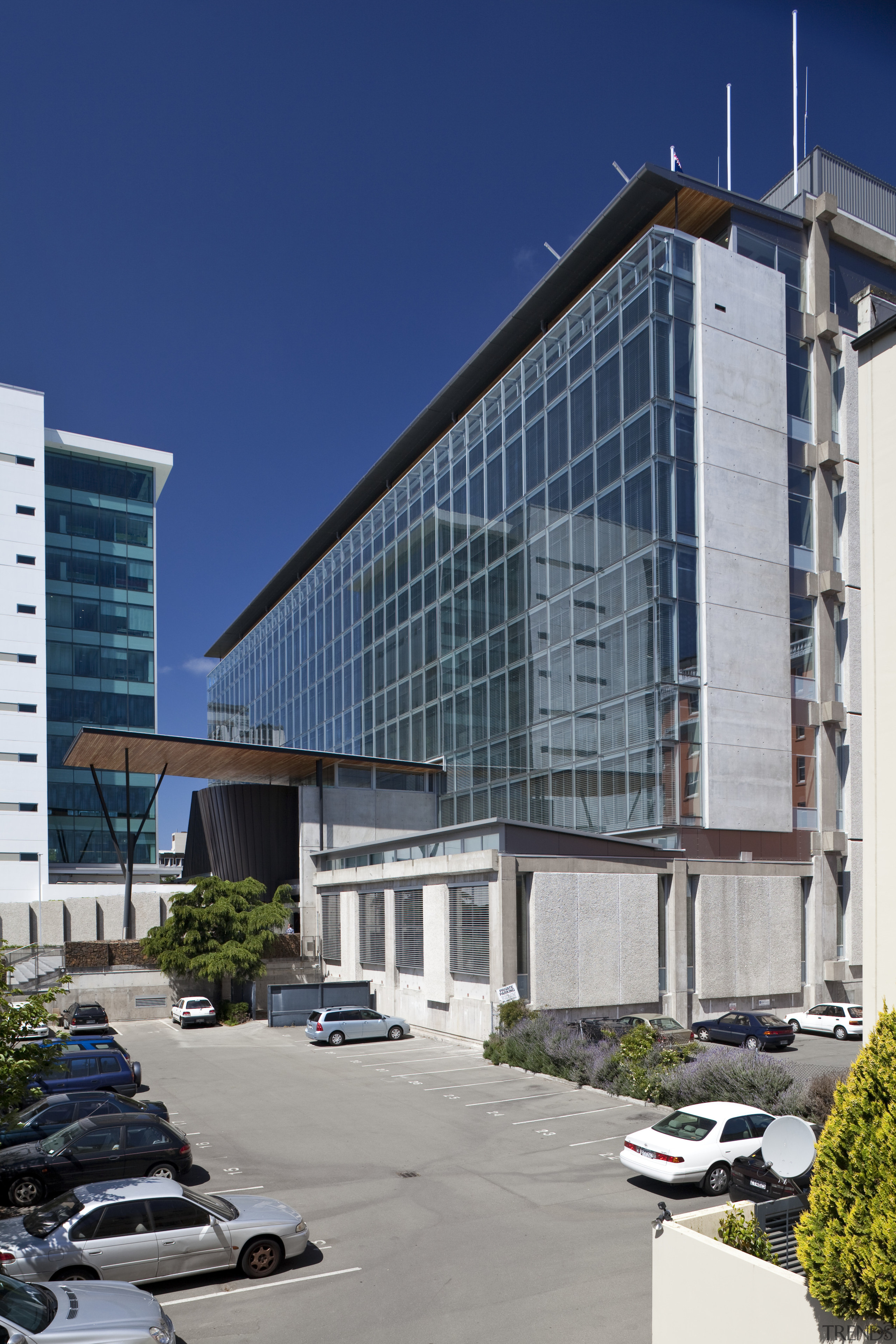 View of curtain wall by Alutech Windows &amp; architecture, building, city, commercial building, condominium, corporate headquarters, daytime, facade, headquarters, metropolis, metropolitan area, mixed use, real estate, residential area, sky, skyscraper, tower block, urban area, blue