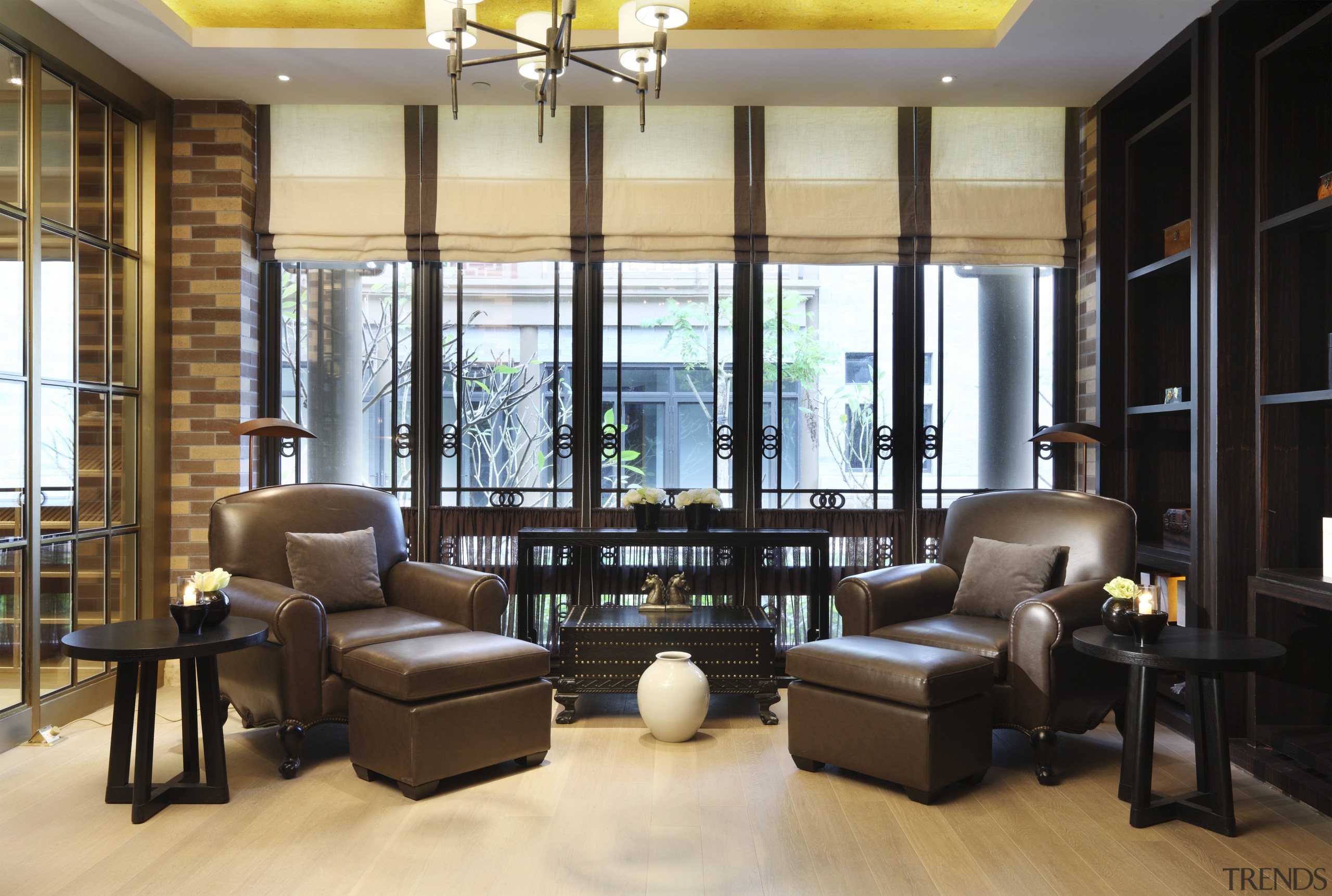 View of seating area with brown furniture. - interior design, living room, lobby, real estate, room, window, black