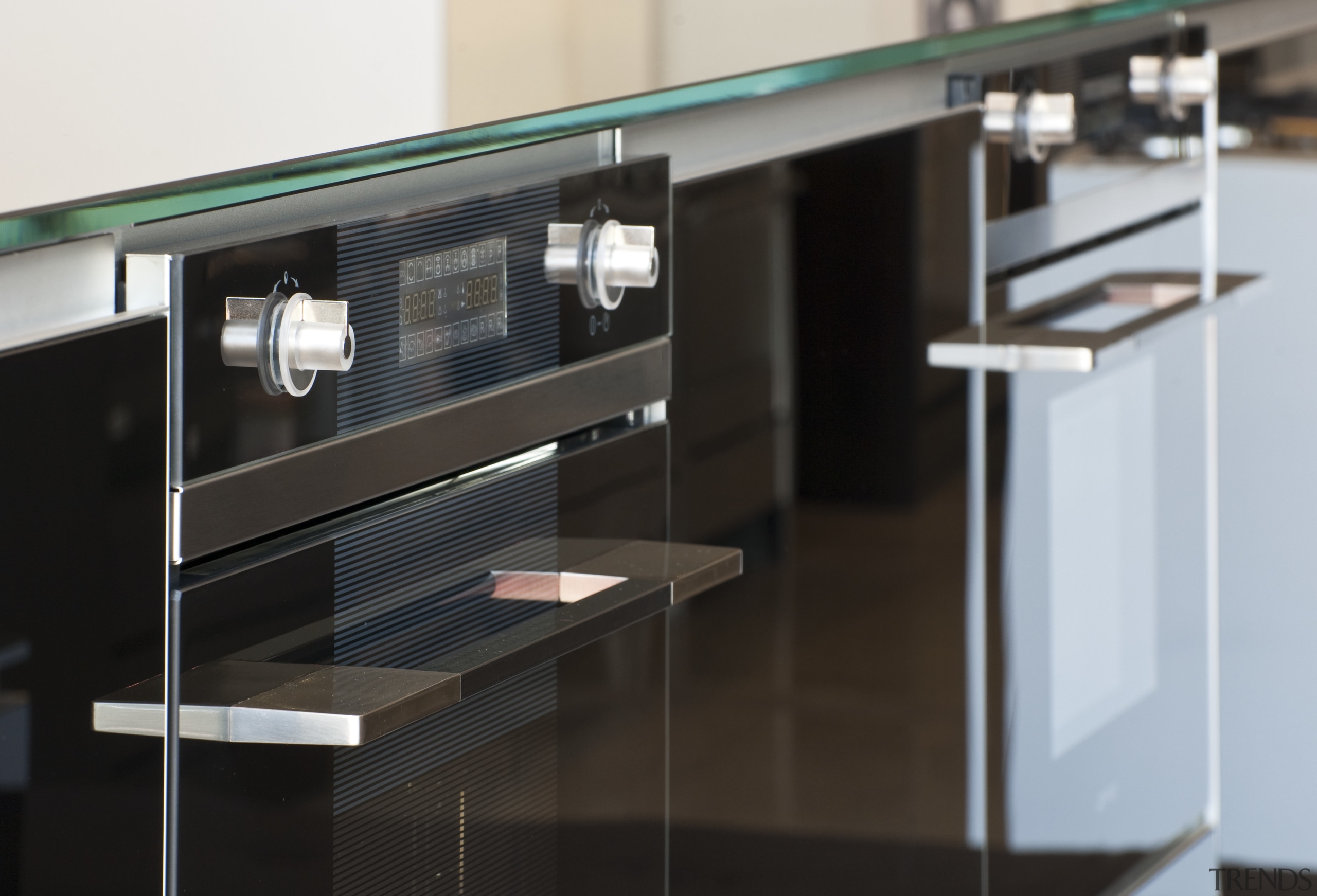 View of kitchen which features Smeg oven. - furniture, glass, product design, black, gray