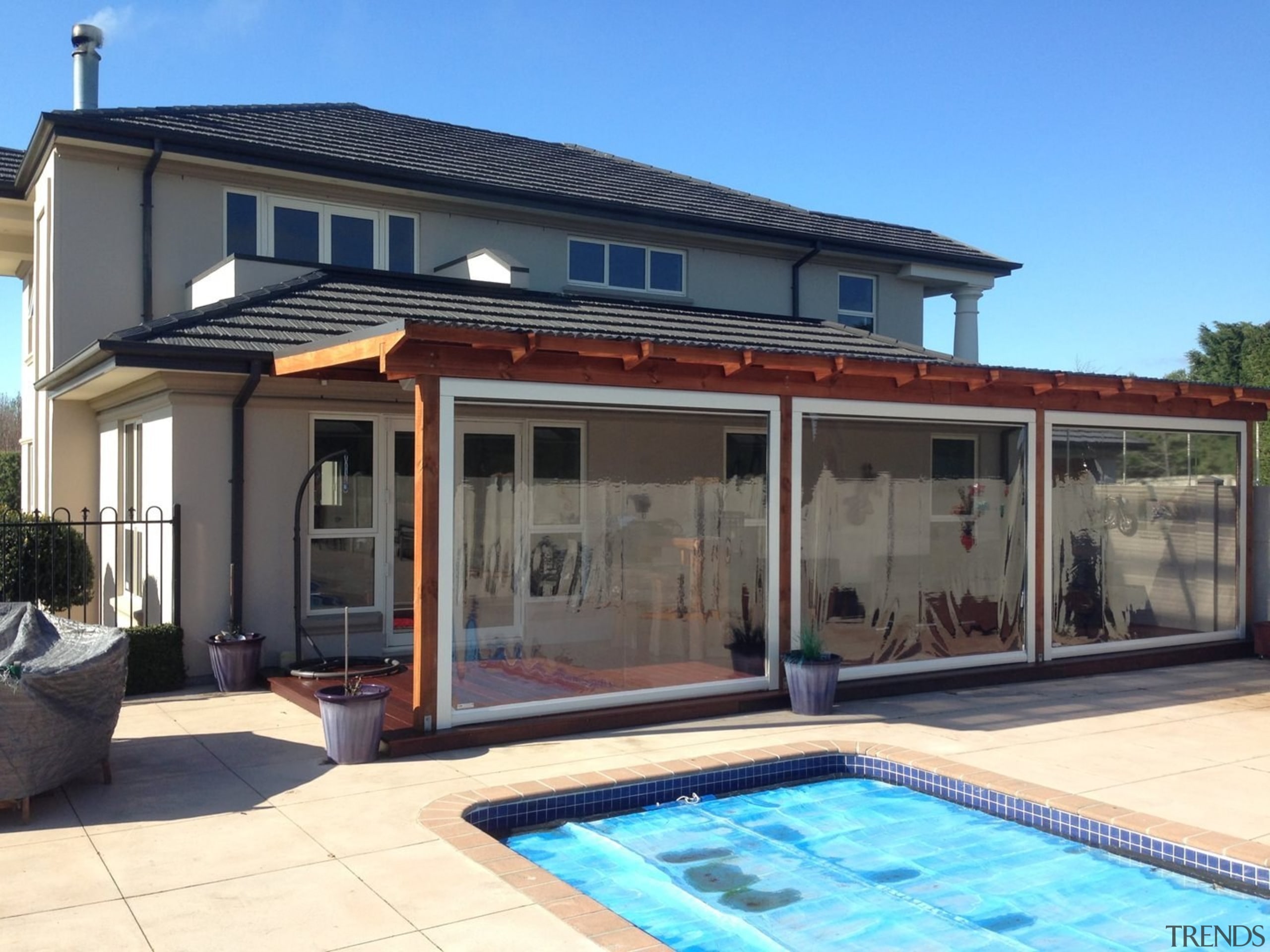 The Calido Zip Outdoor Screen by Johnson &amp; house, property, real estate, swimming pool, villa, window, teal