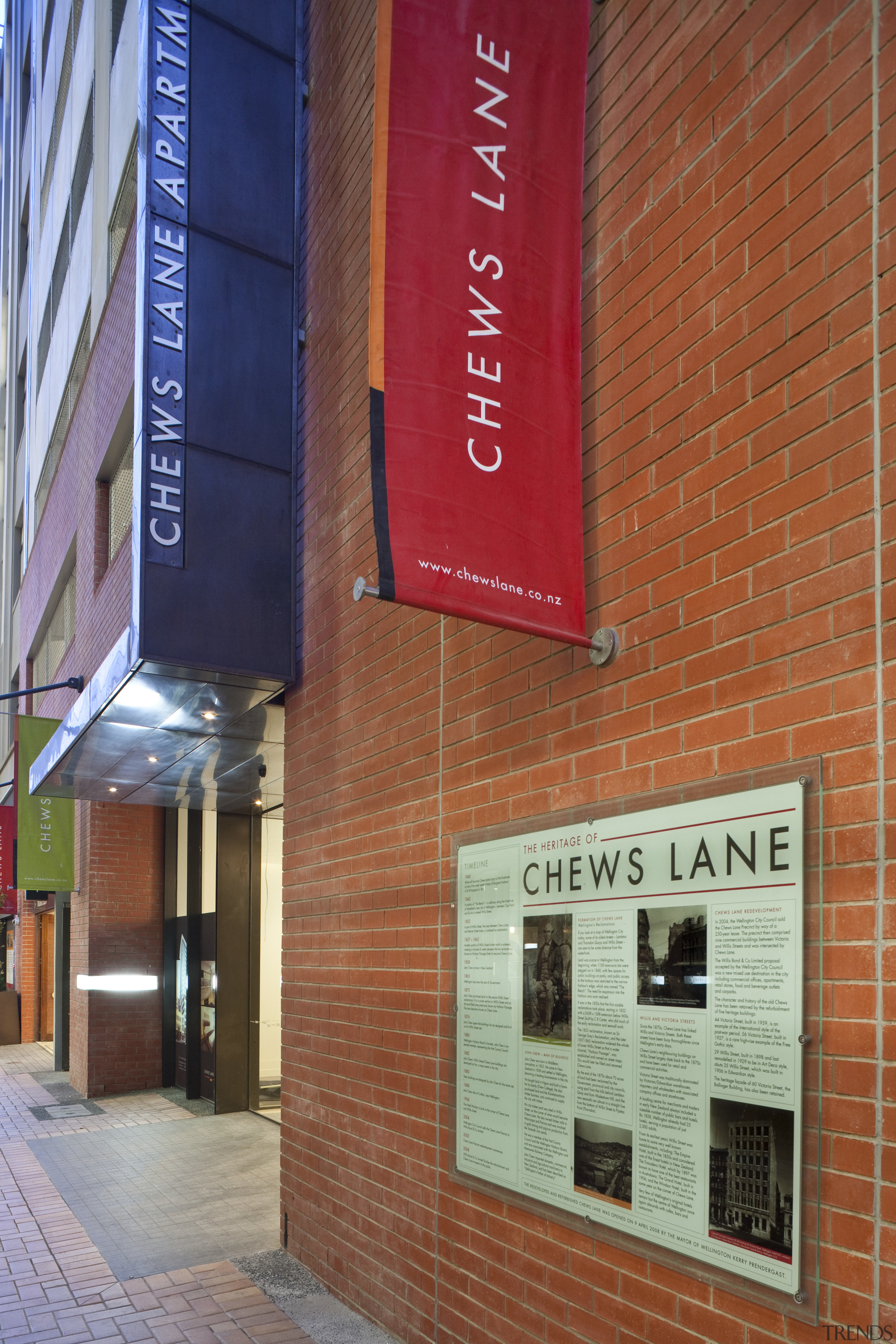 exterior view of willis bond &amp; co development advertising, architecture, brick, building, city, facade, neighbourhood, signage, wall, window, red