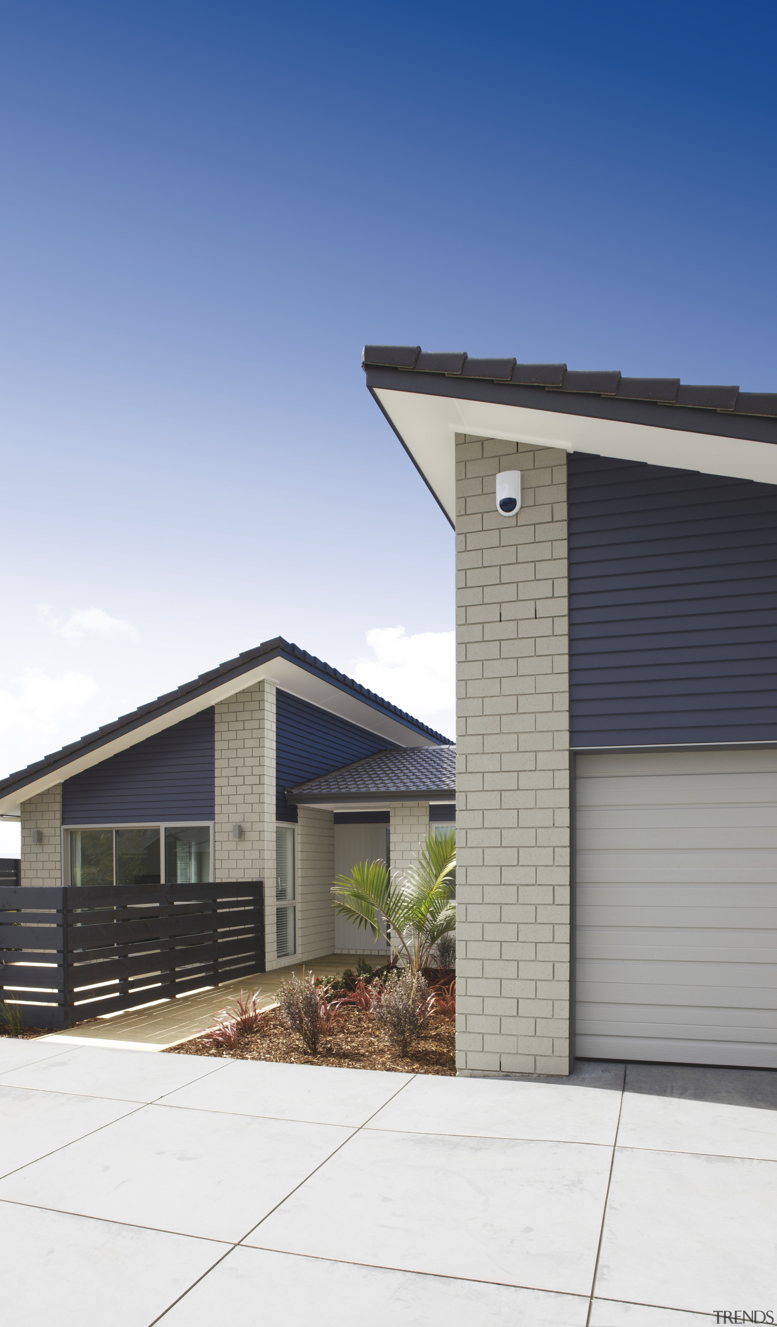 Exterior view of Platinum Homes show home in architecture, building, elevation, facade, home, house, property, real estate, residential area, siding, sky, suburb, white