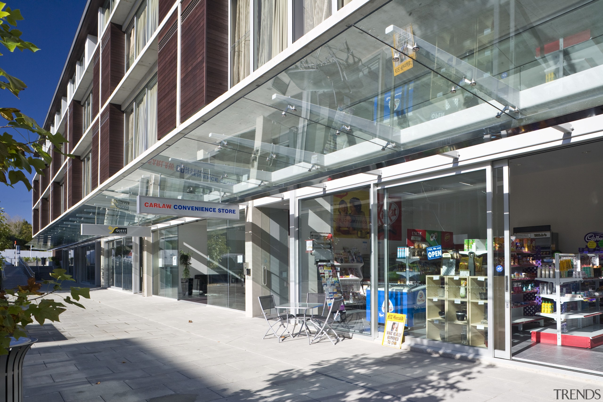 Exterior view of a building in Carlaw Park building, metropolitan area, mixed use, real estate, retail, gray