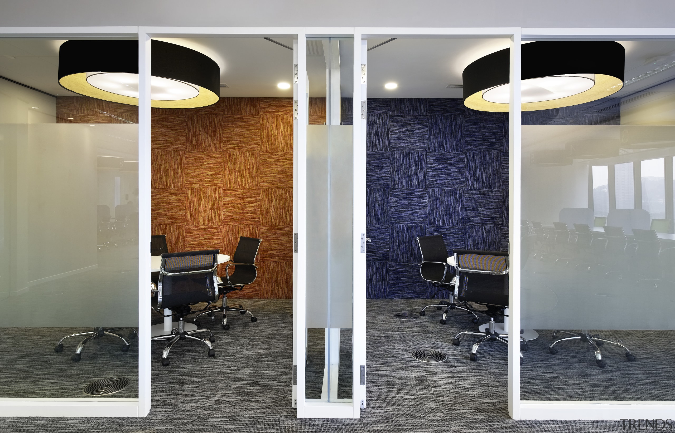 In the AMGeneral fit-out, private booths on the ceiling, floor, flooring, glass, interior design, light fixture, lighting, structure, wall, gray