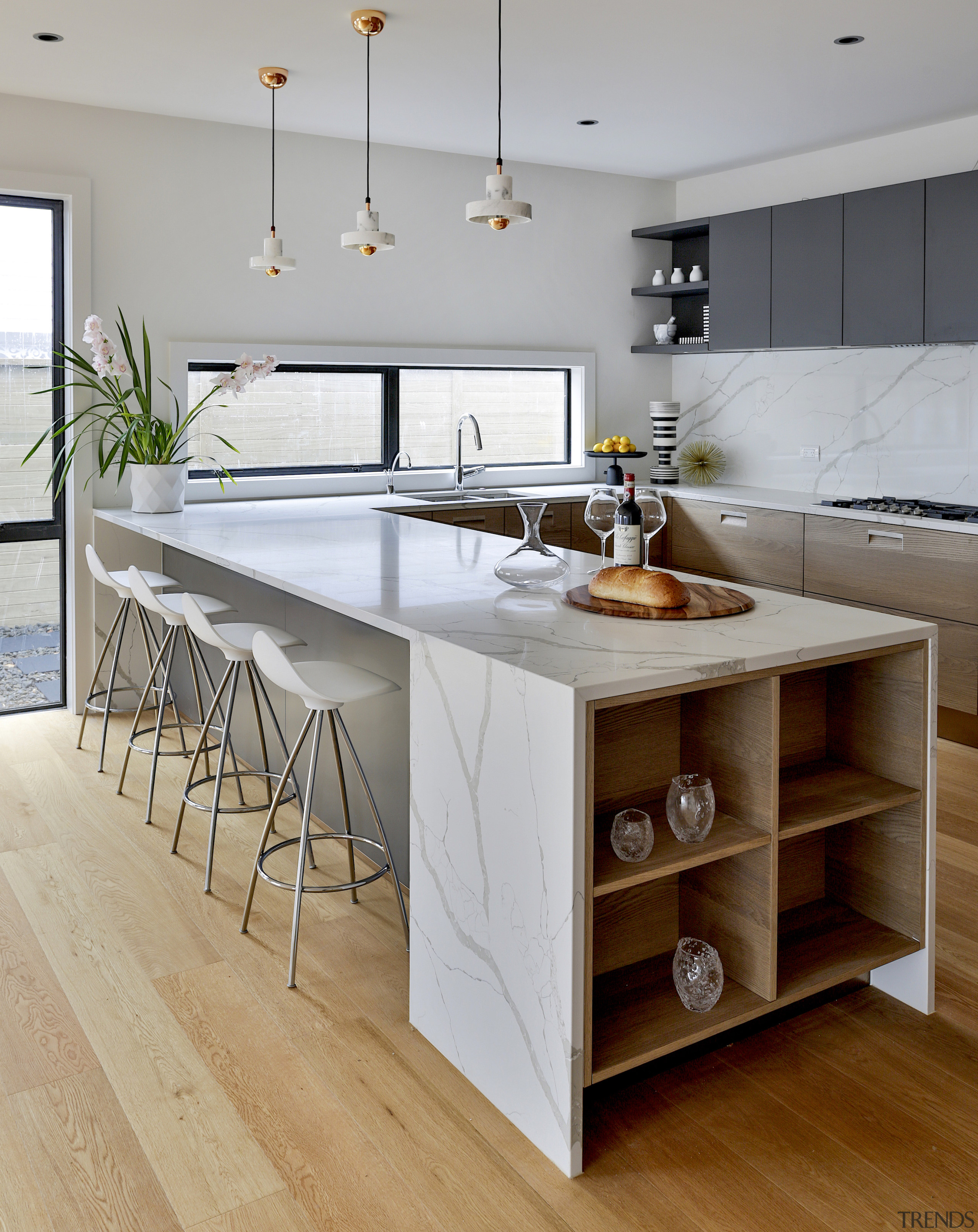 The trendstone quartz benchtop with boxed waterfall ends 