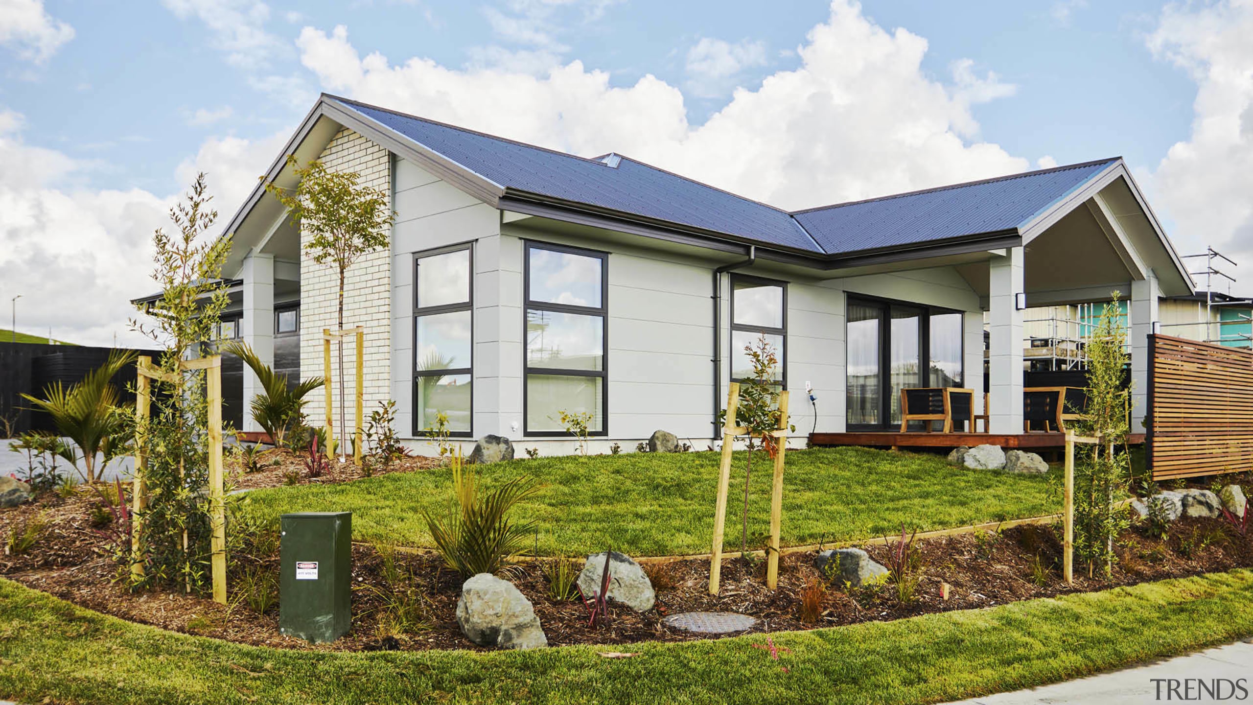 Complementary cladding finishes give the home a sophisticated 