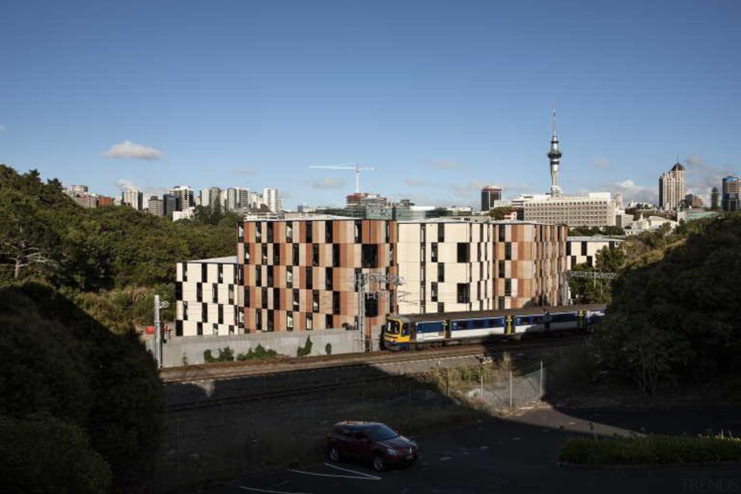 Carlaw Park Student Village in Auckland accommodates students apartment, architecture, building, city, estate, neighbourhood, property, real estate, residential area, sky, suburb, town, tree, urban area, black, teal