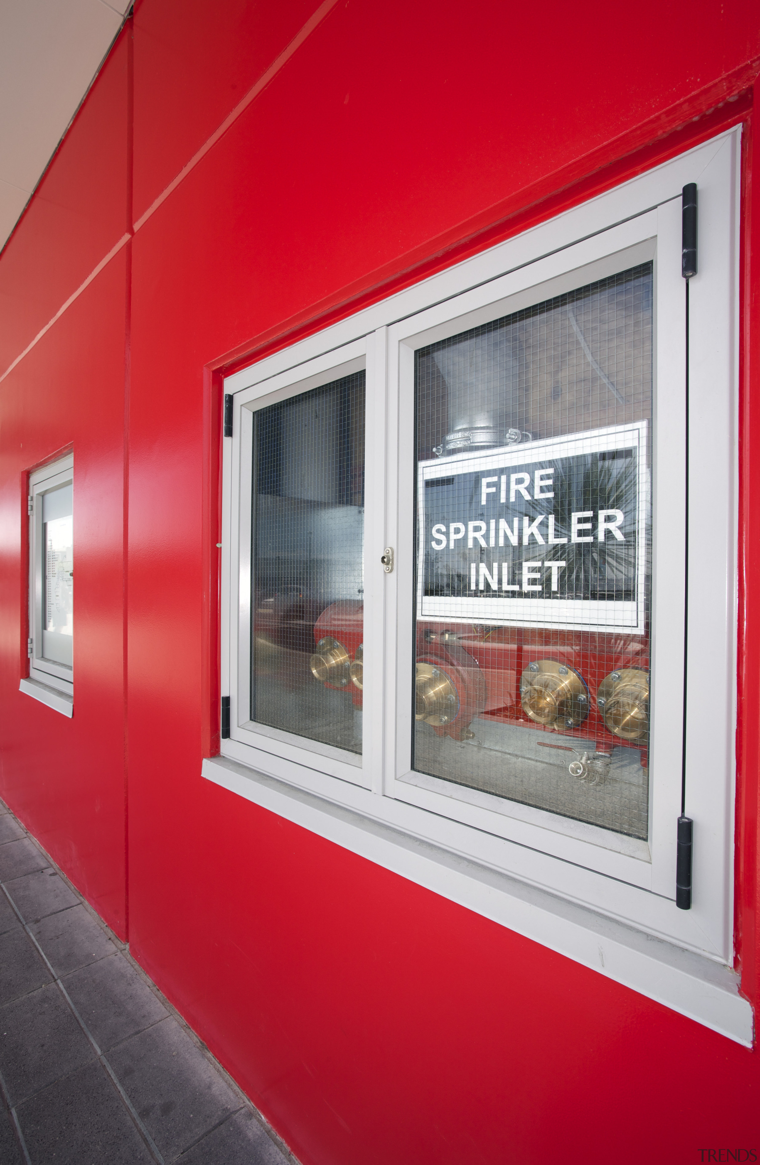 Protech Designs fire protection for Silverdale Centre window, red