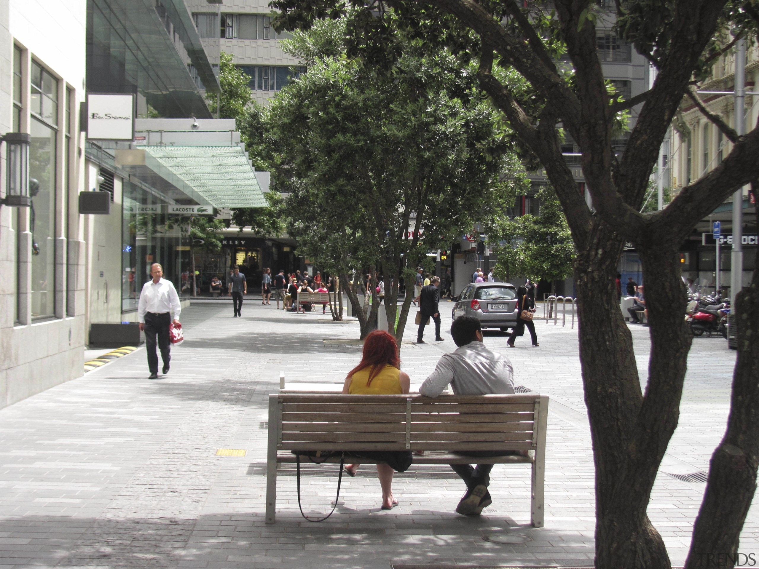 People-friendly streetscapes are revitalising our cities, as the city, neighbourhood, pedestrian, plant, public space, road, sidewalk, street, town, tree, urban area, black, white