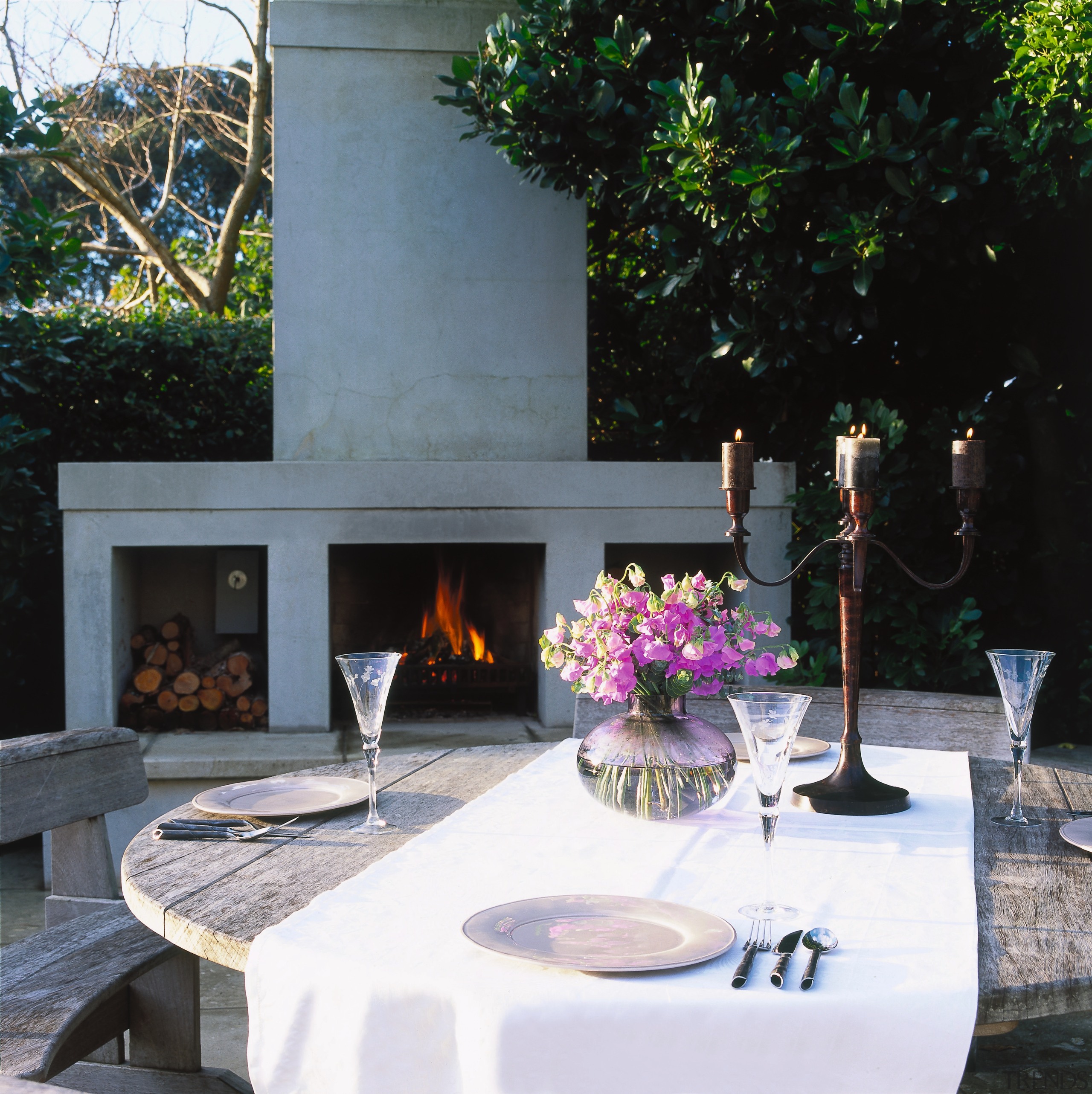 Inner view of the outdoor living area - backyard, courtyard, furniture, hearth, interior design, outdoor structure, patio, table, black