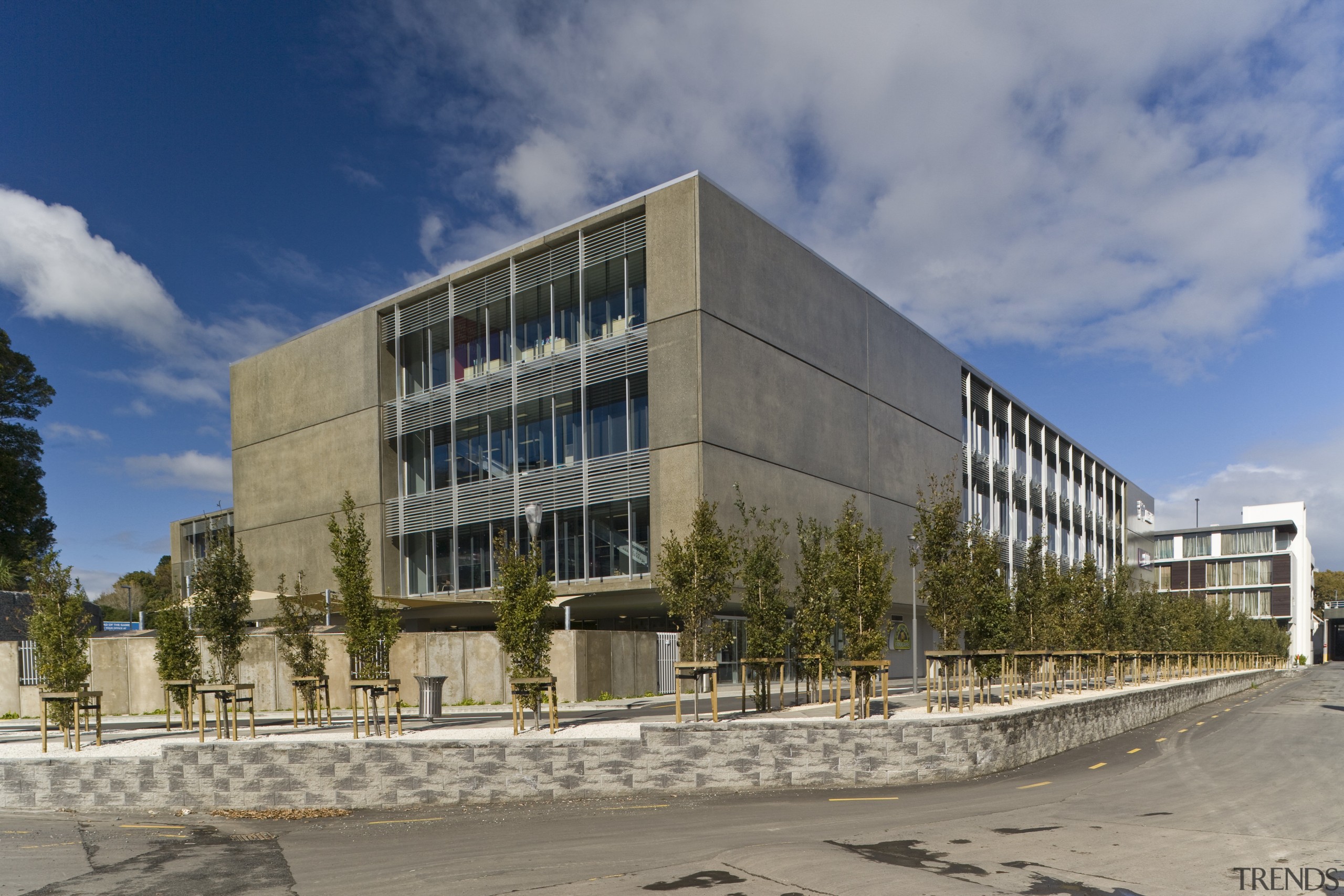 Exterior view of Carlaw Park which was developed architecture, building, commercial building, condominium, corporate headquarters, daytime, facade, headquarters, mixed use, real estate, sky, gray